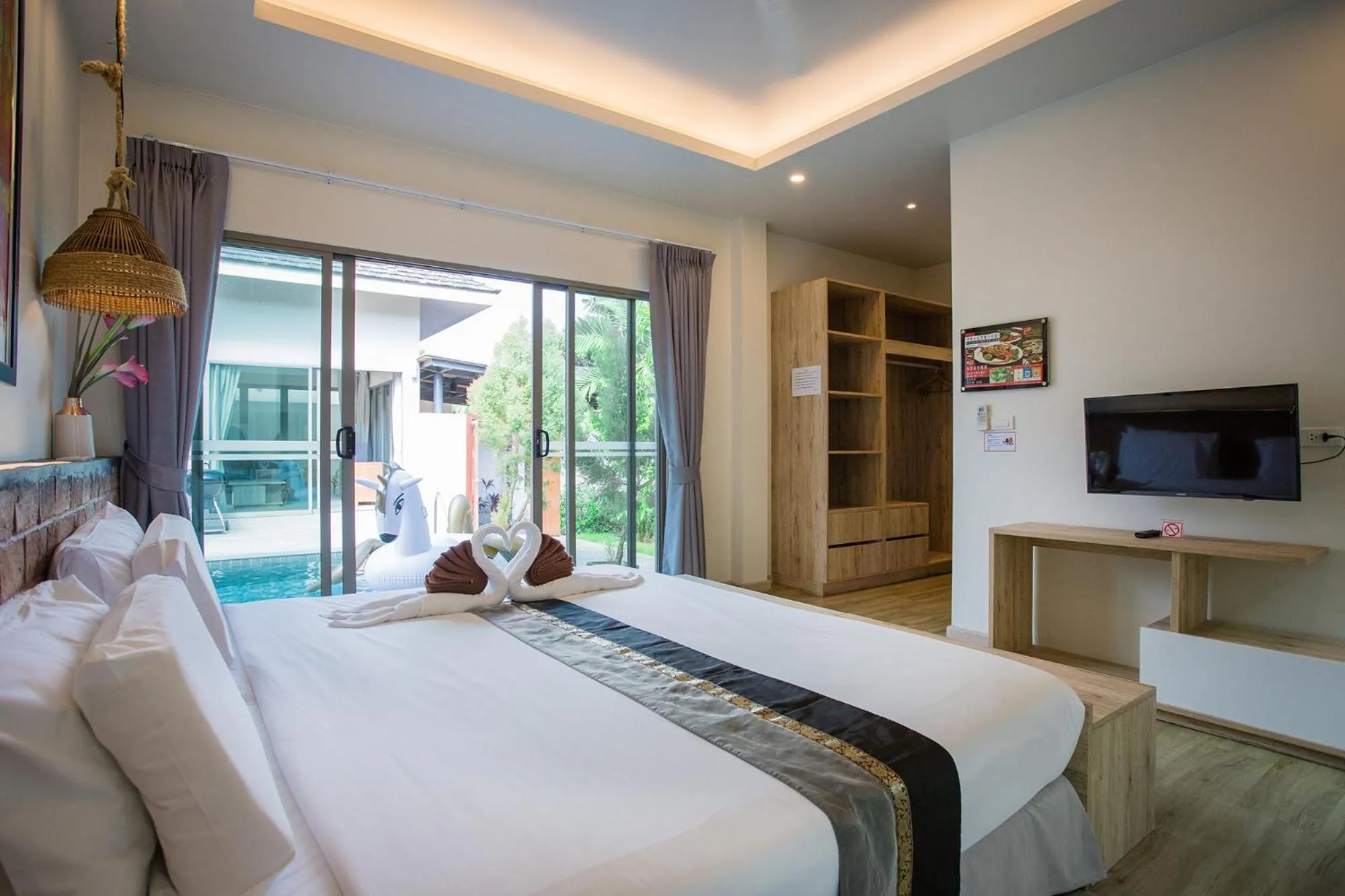 Photo of the whole room, Bed in Yipmunta Pool Villa - SHA Plus Certified