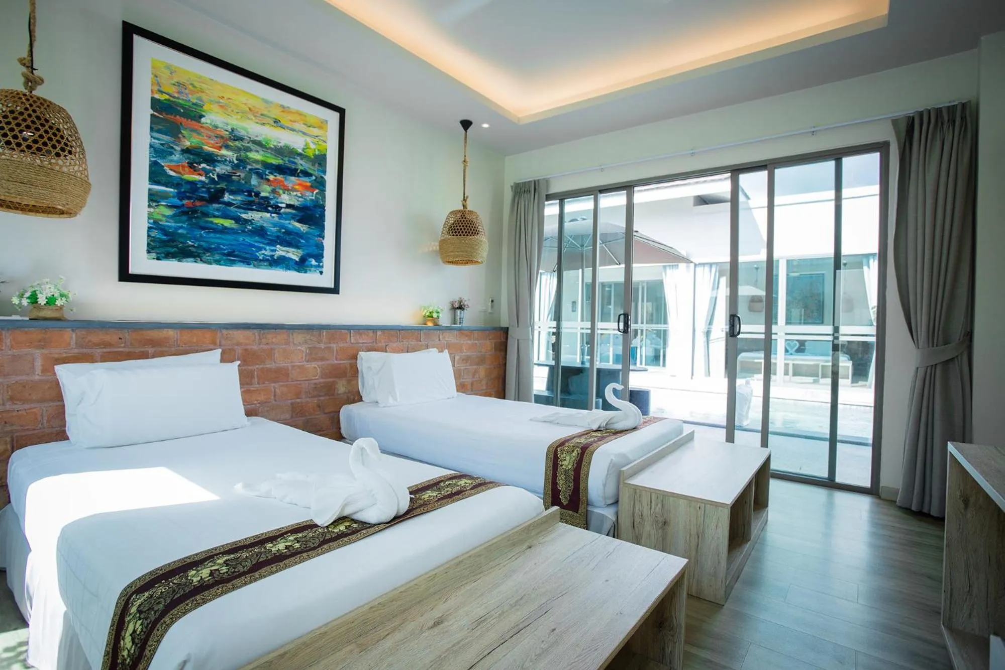 Bed in Yipmunta Pool Villa - SHA Plus Certified