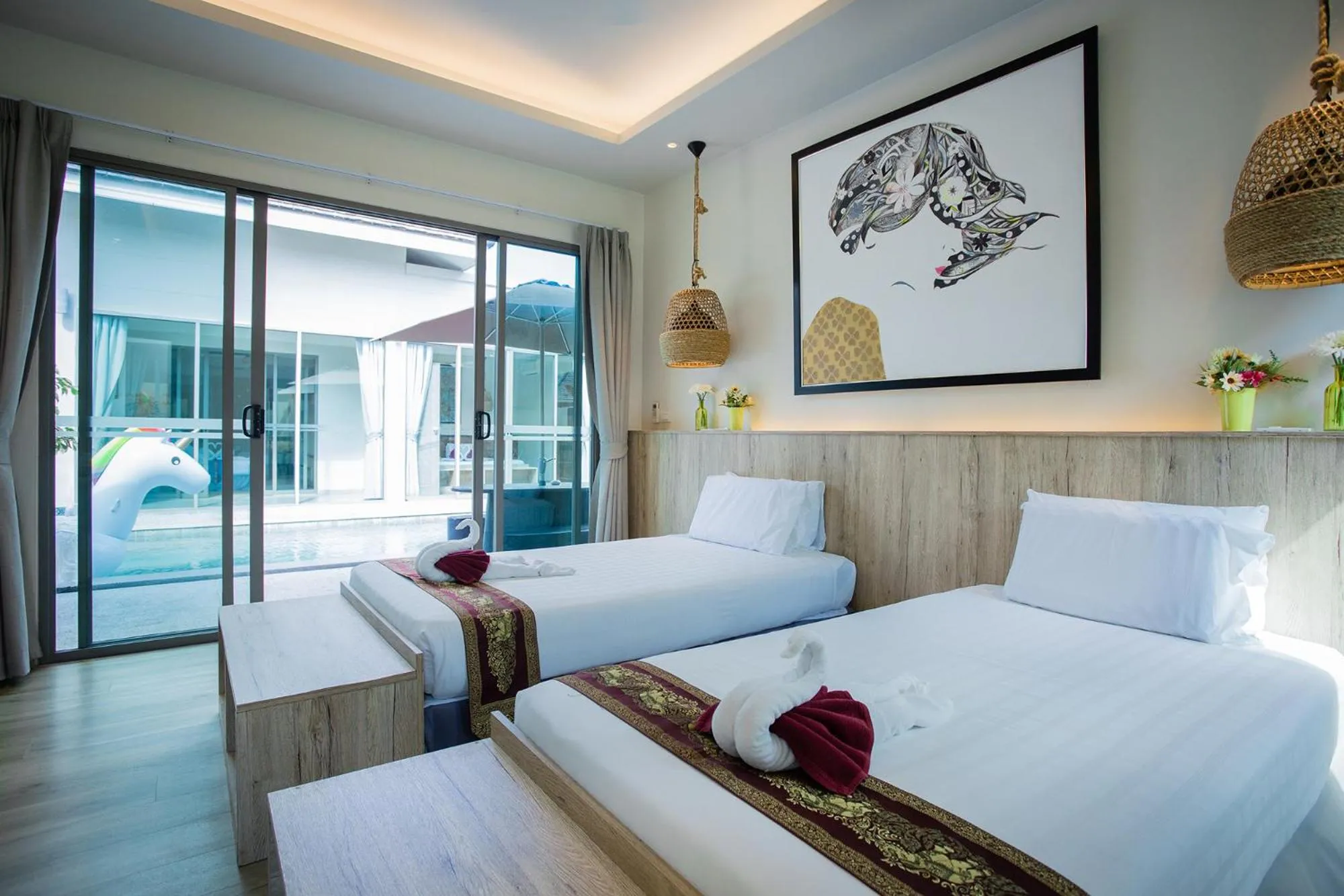 Bed in Yipmunta Pool Villa - SHA Plus Certified