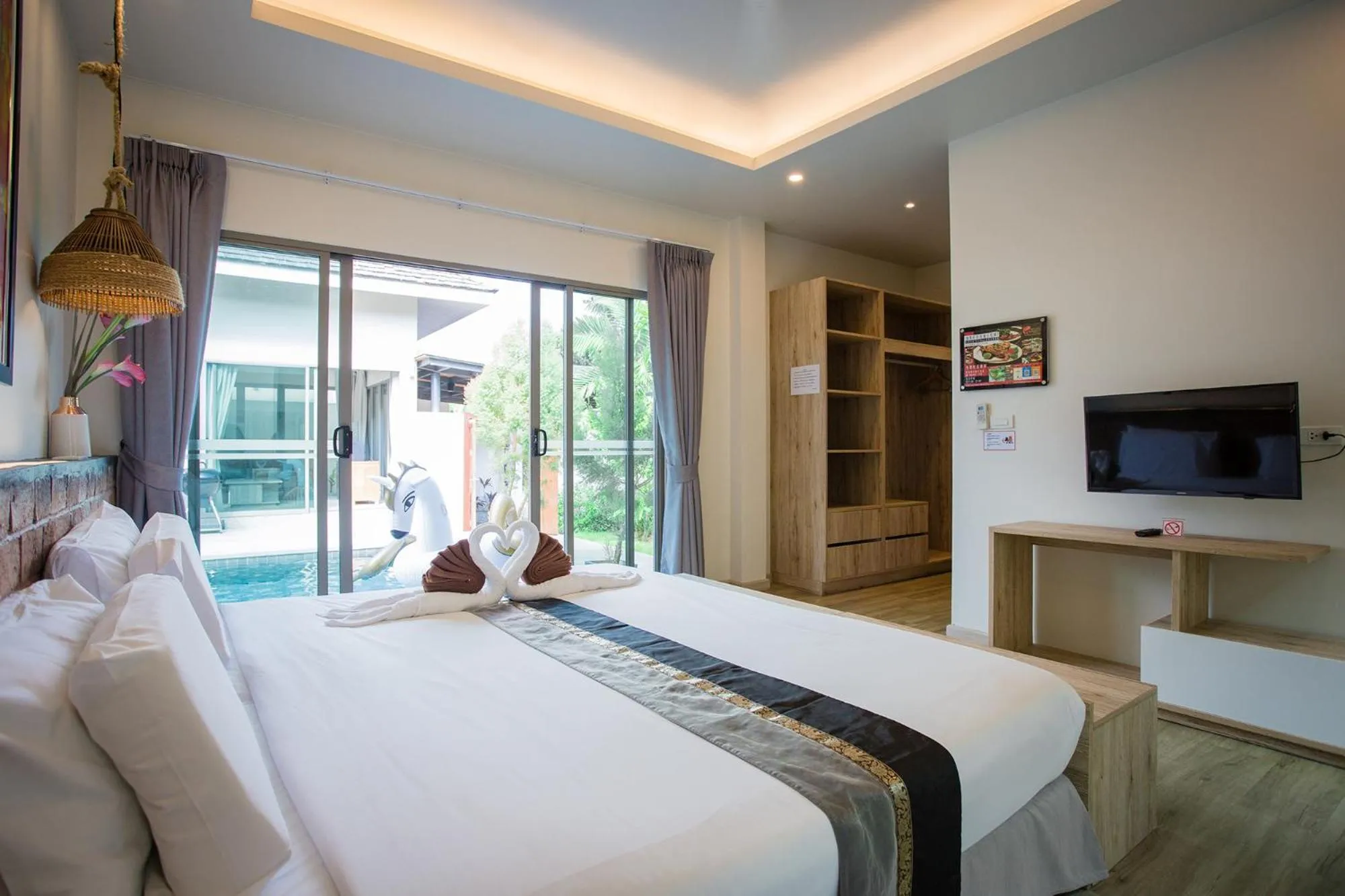 Photo of the whole room, Bed in Yipmunta Pool Villa - SHA Plus Certified