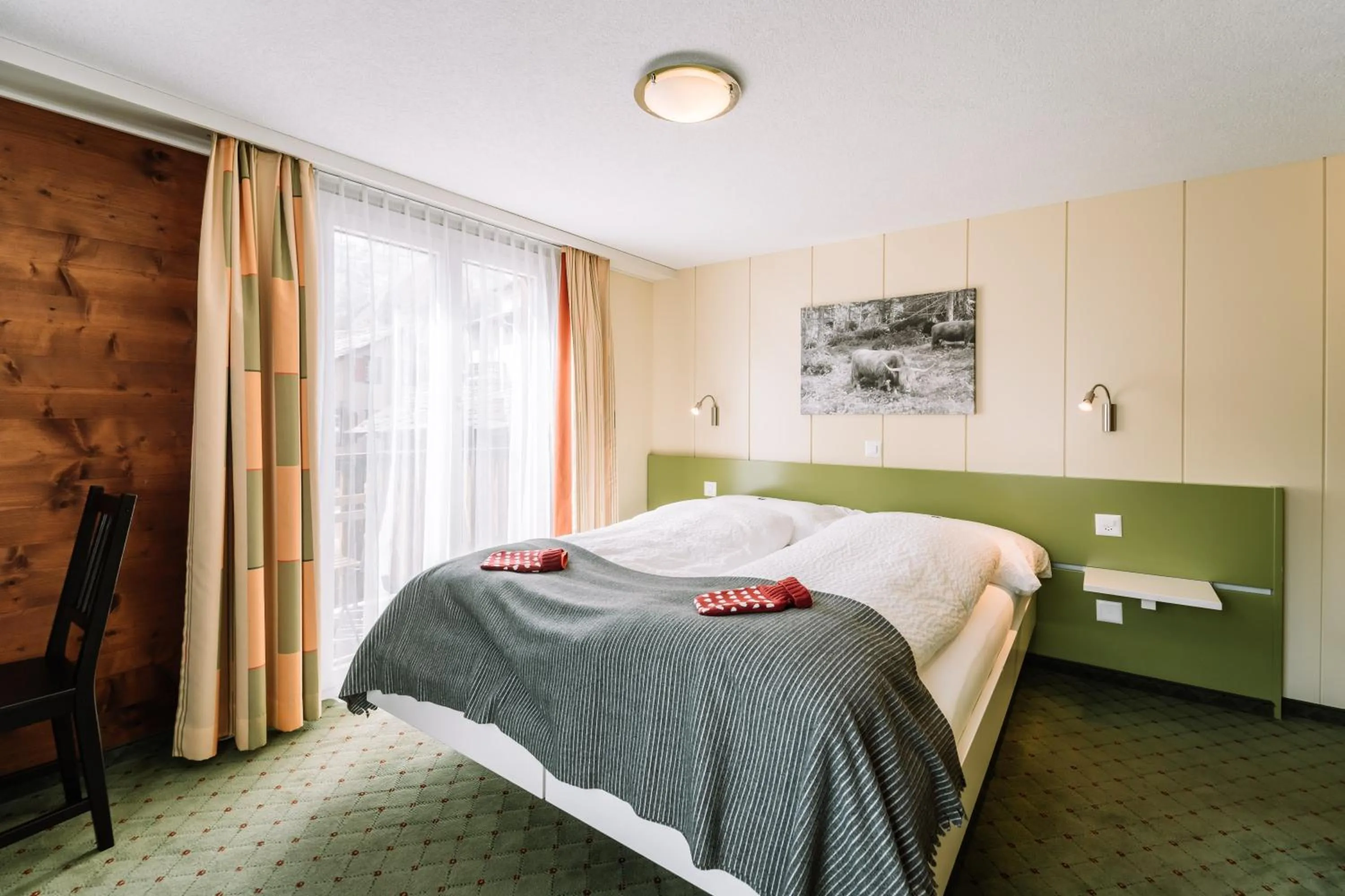 Bed in Hotel Les Amis