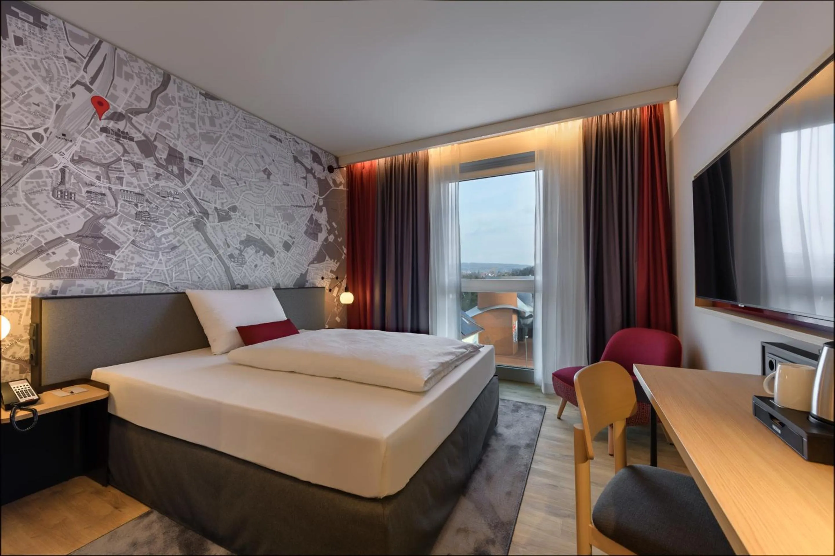 Photo of the whole room, Bed in IntercityHotel Herford