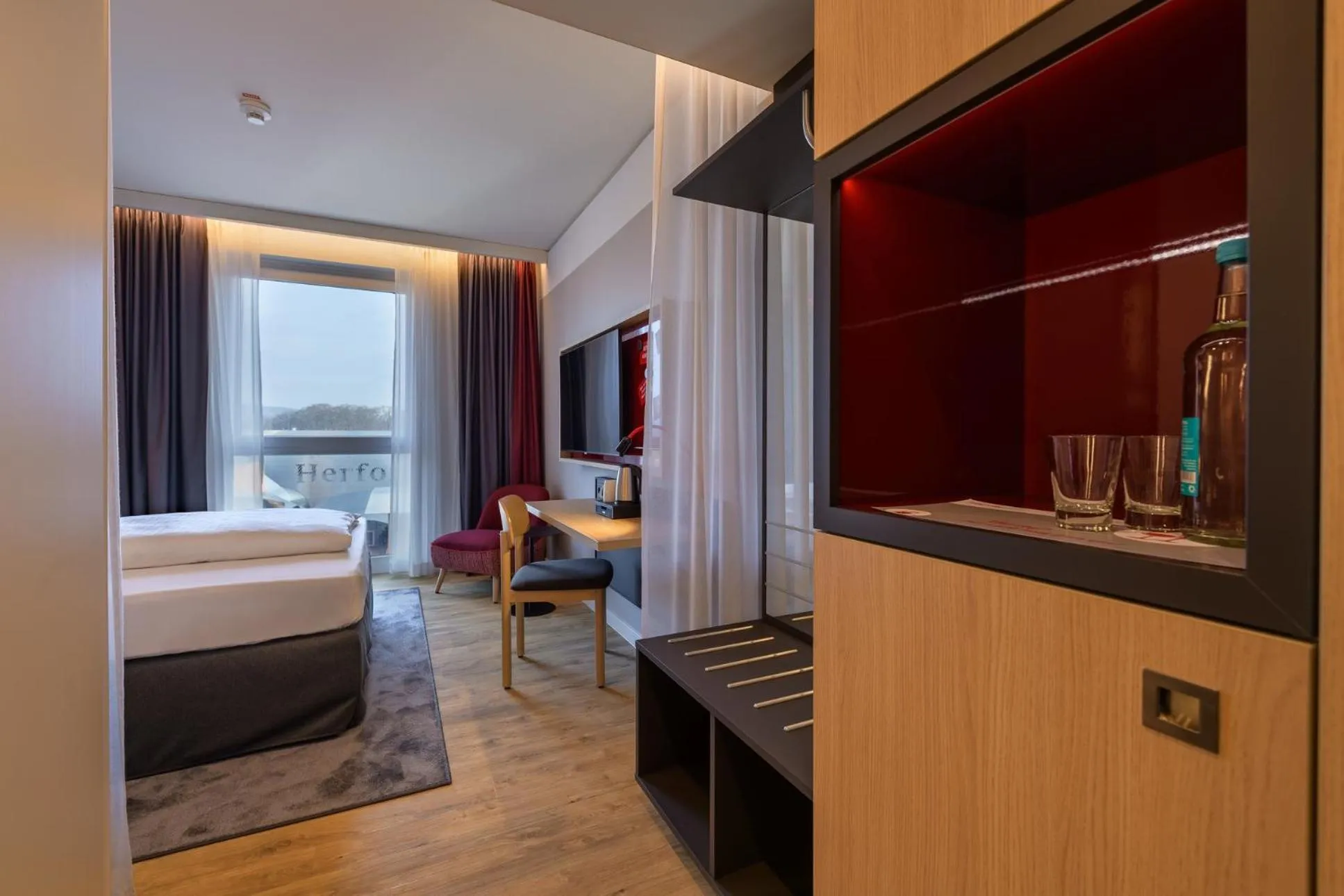 Photo of the whole room, Bed in IntercityHotel Herford