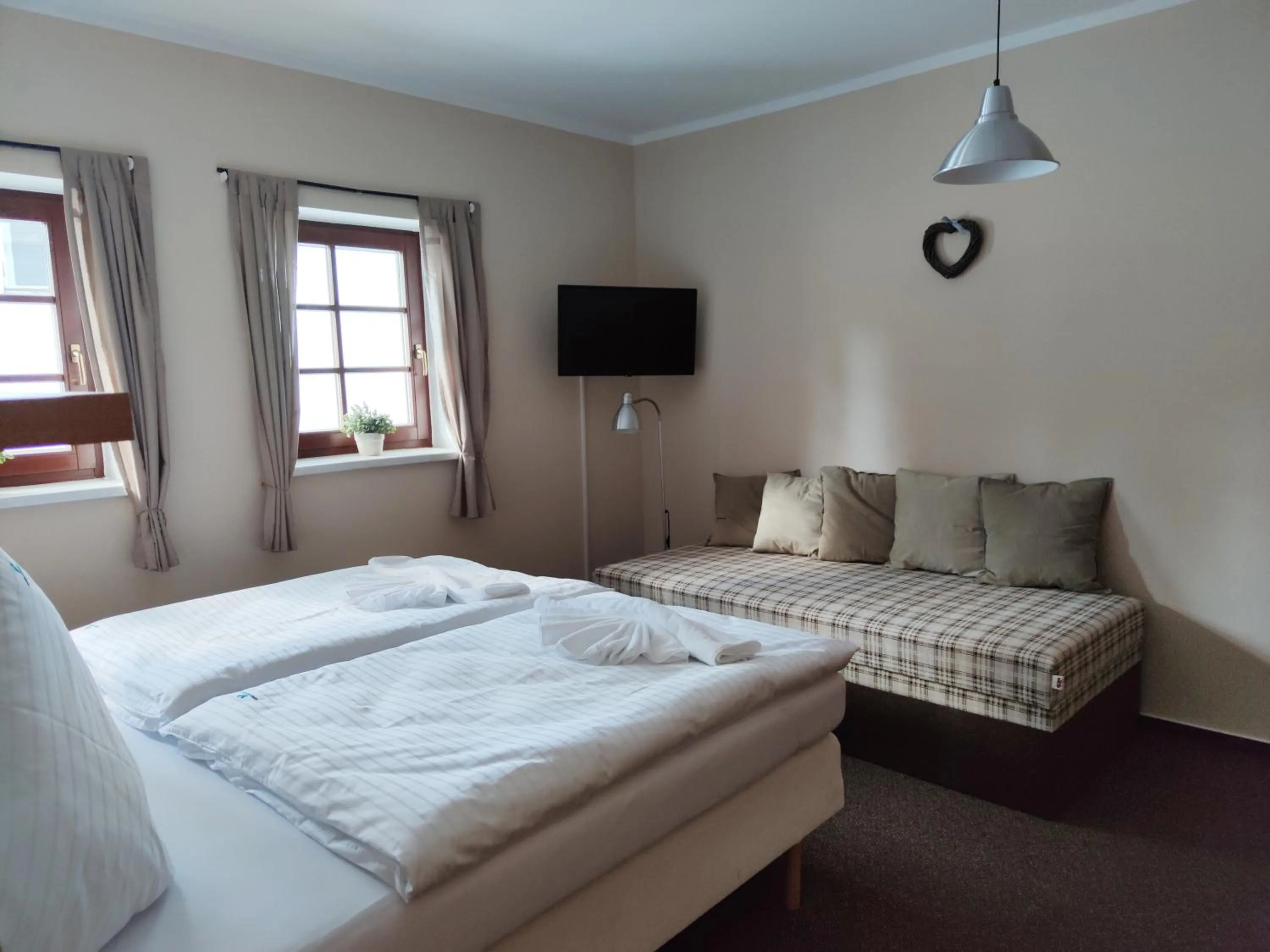 Bed in Hotel Modrásek