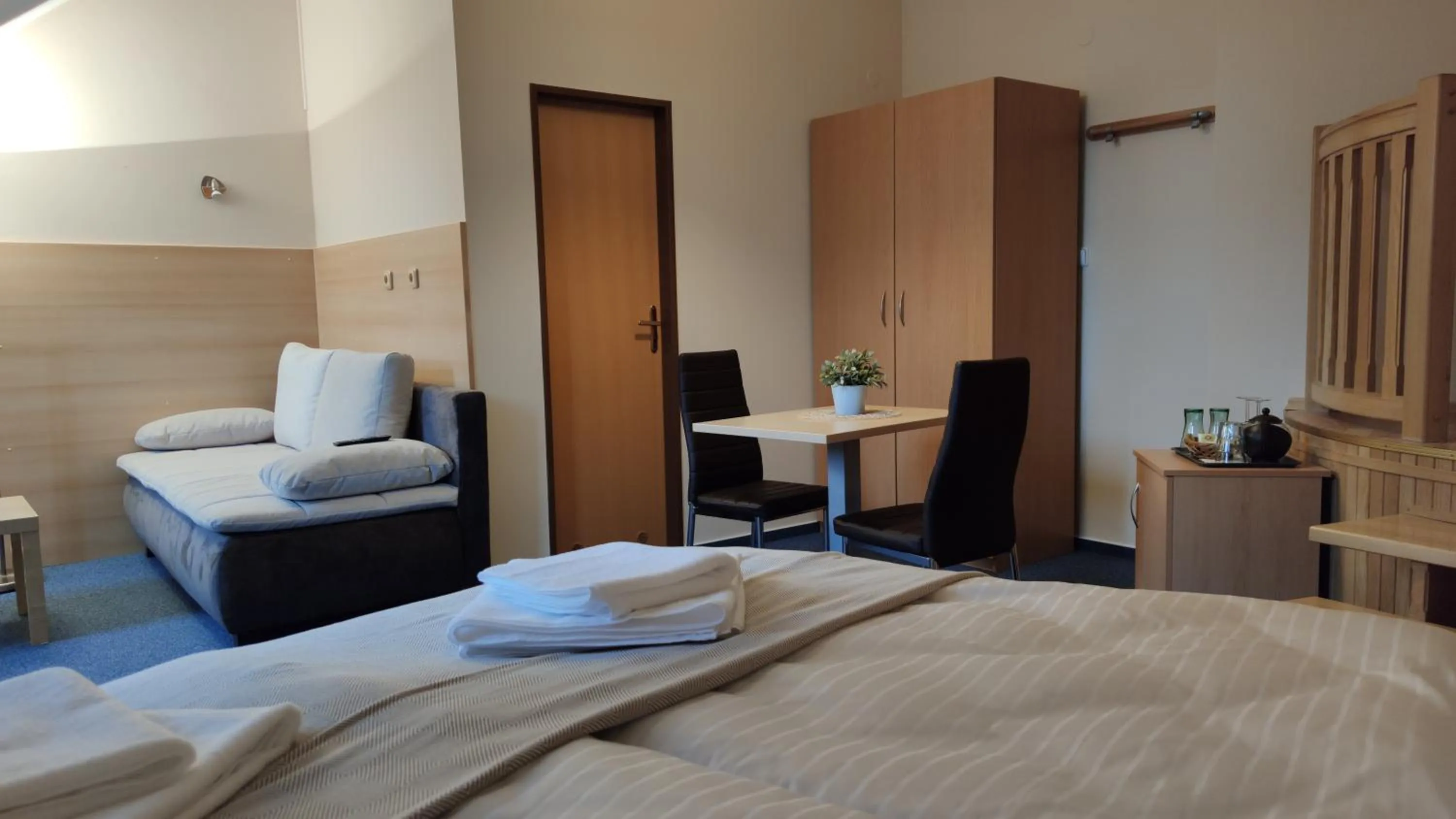 Bed in Hotel Modrásek