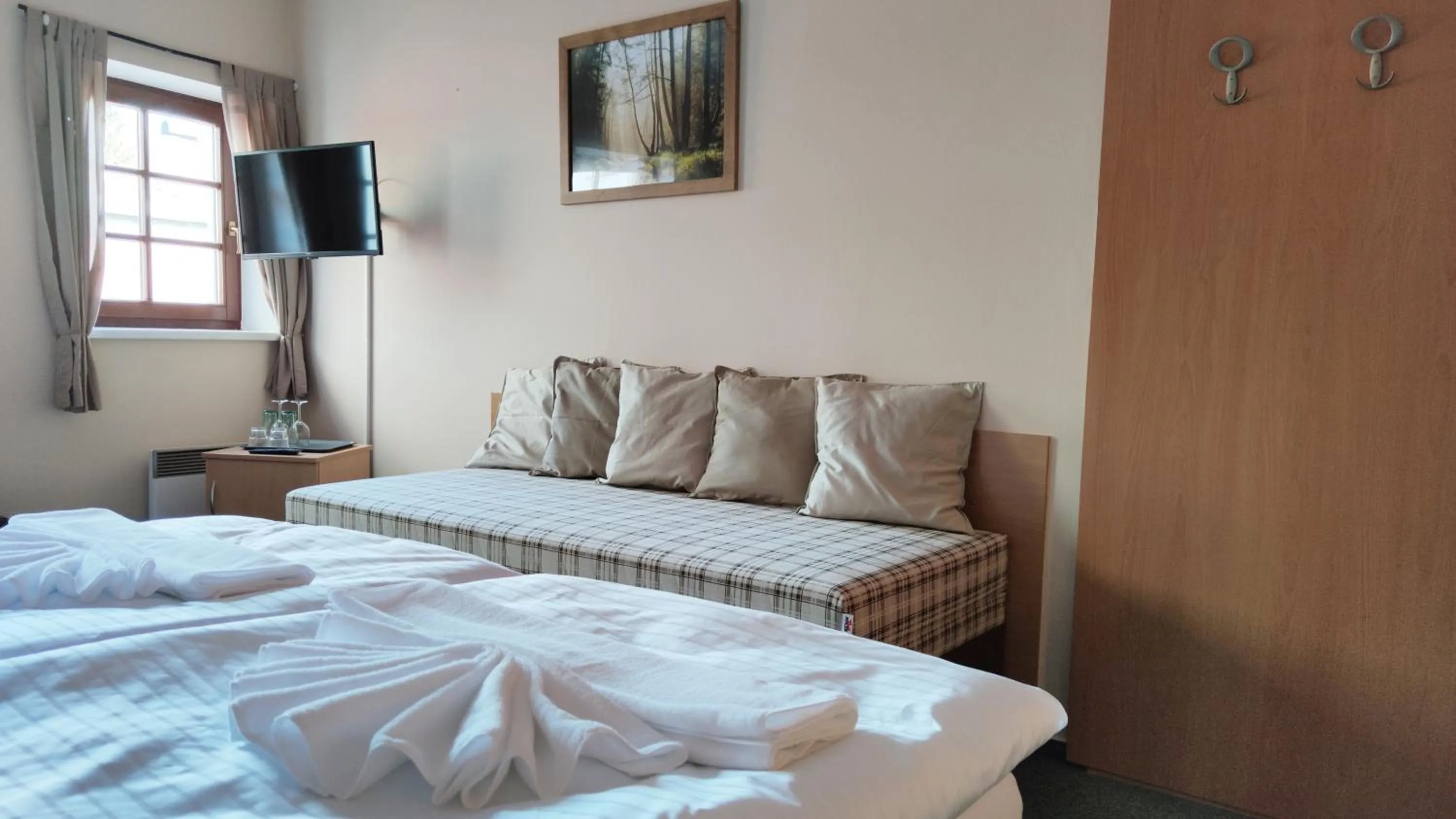 Bed in Hotel Modrásek