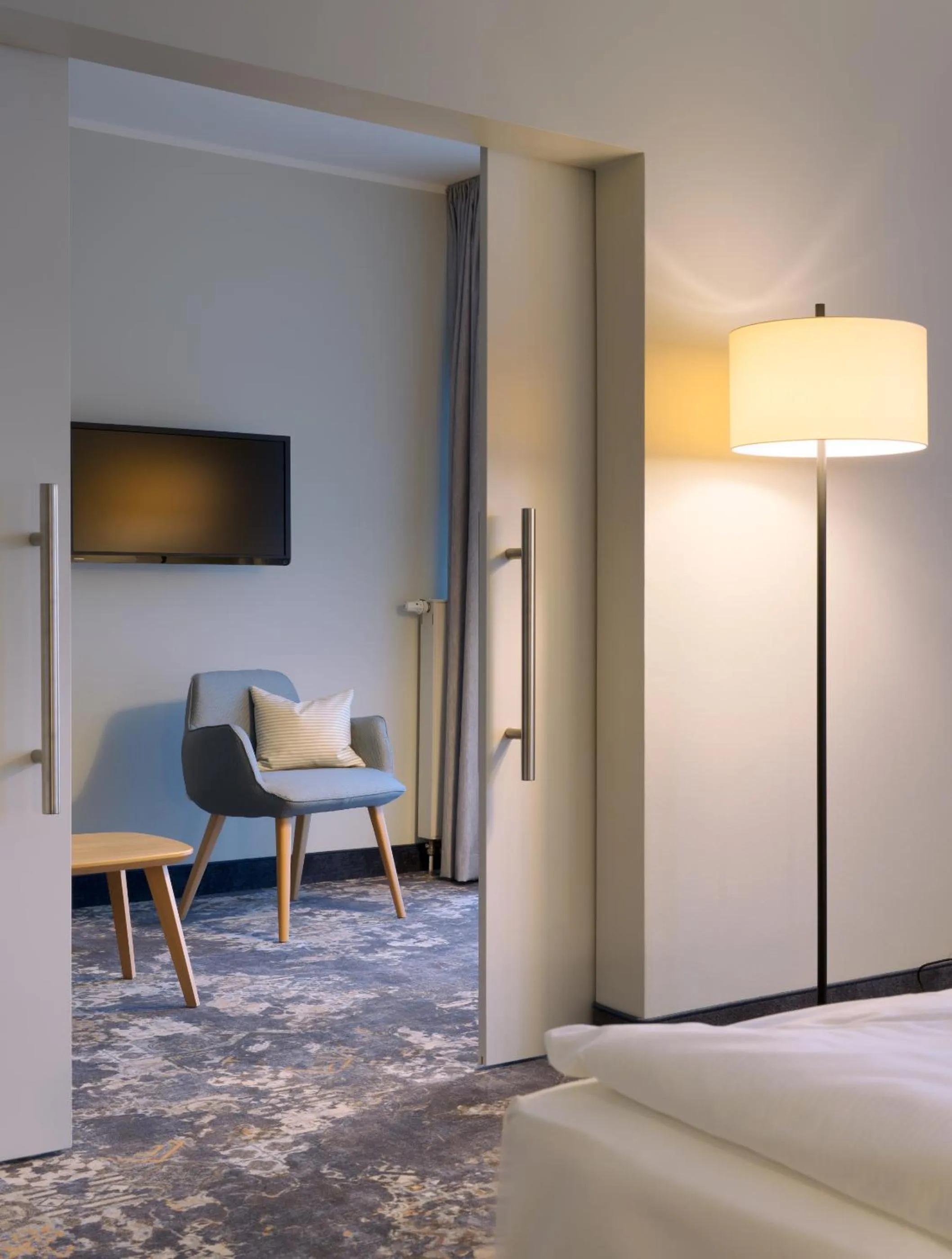 Seating area, Bed in Hotel am Kloster