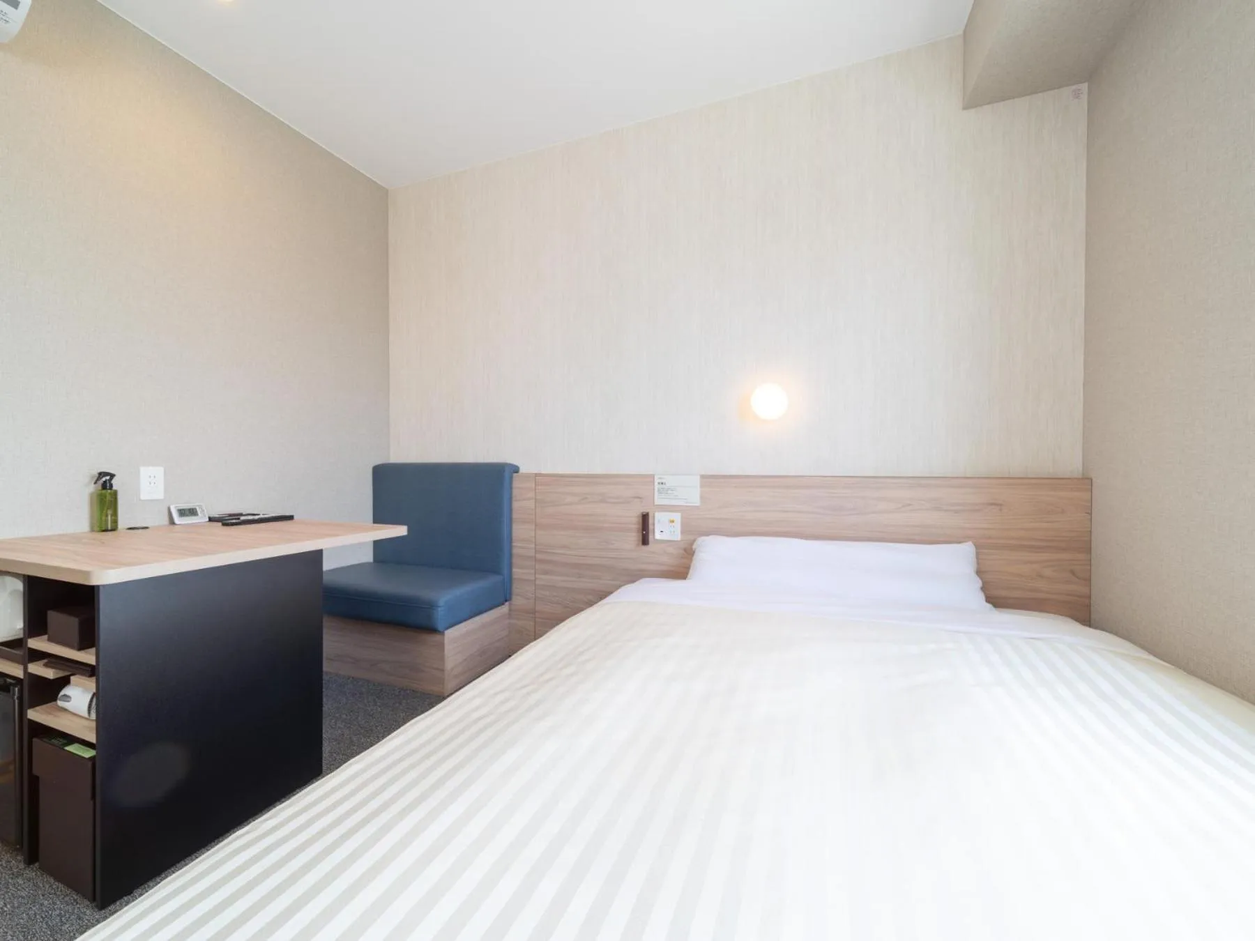 Bed in Super Hotel Iyo Saijo