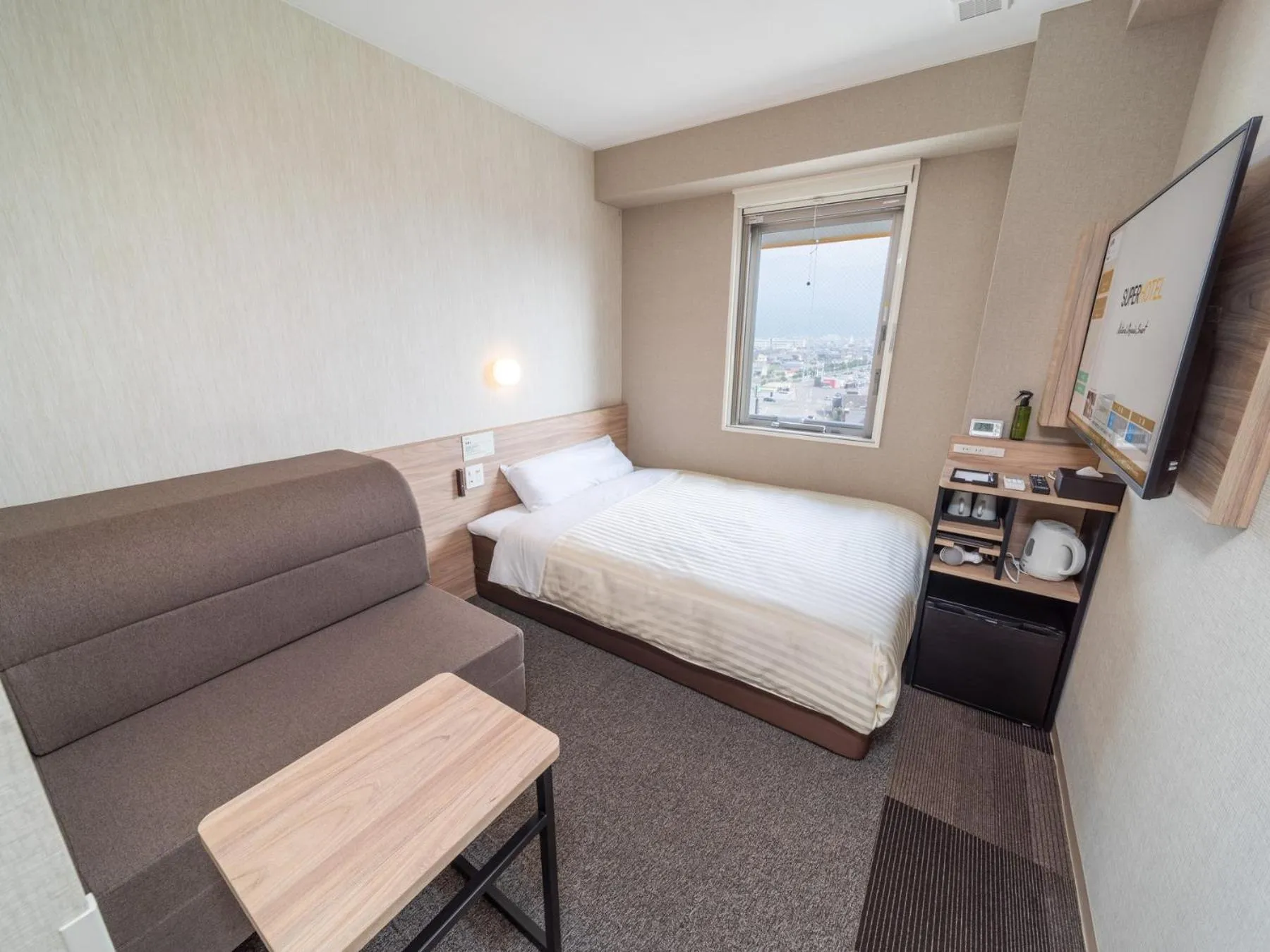 Bed in Super Hotel Iyo Saijo