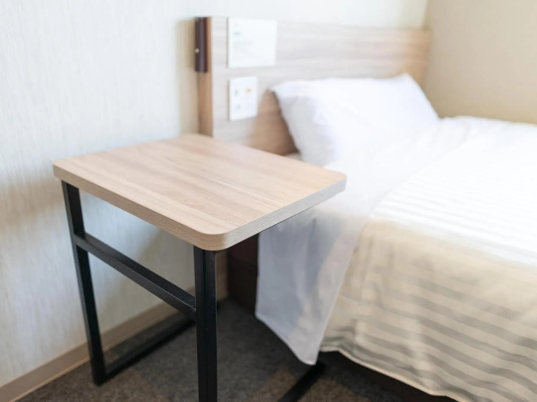 Bed in Super Hotel Iyo Saijo