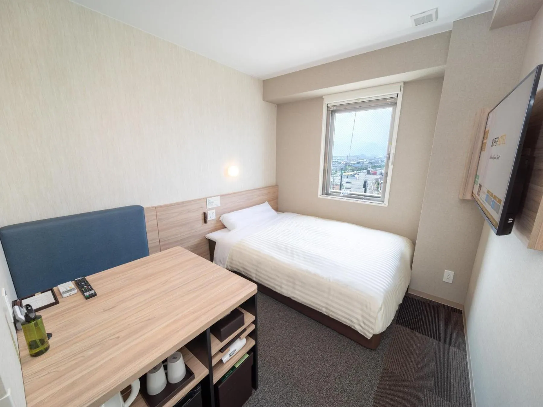 Bed in Super Hotel Iyo Saijo