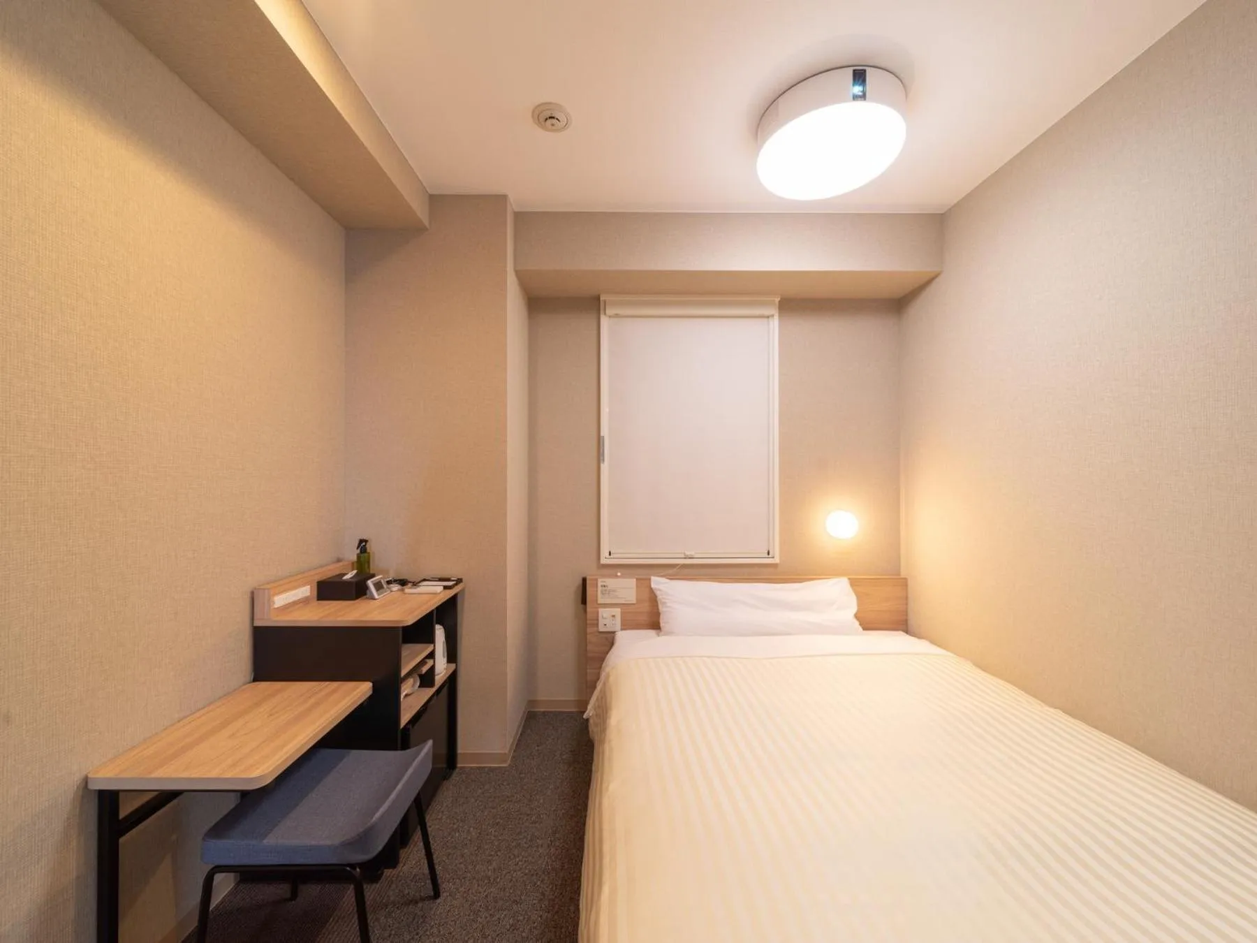 Bed in Super Hotel Iyo Saijo
