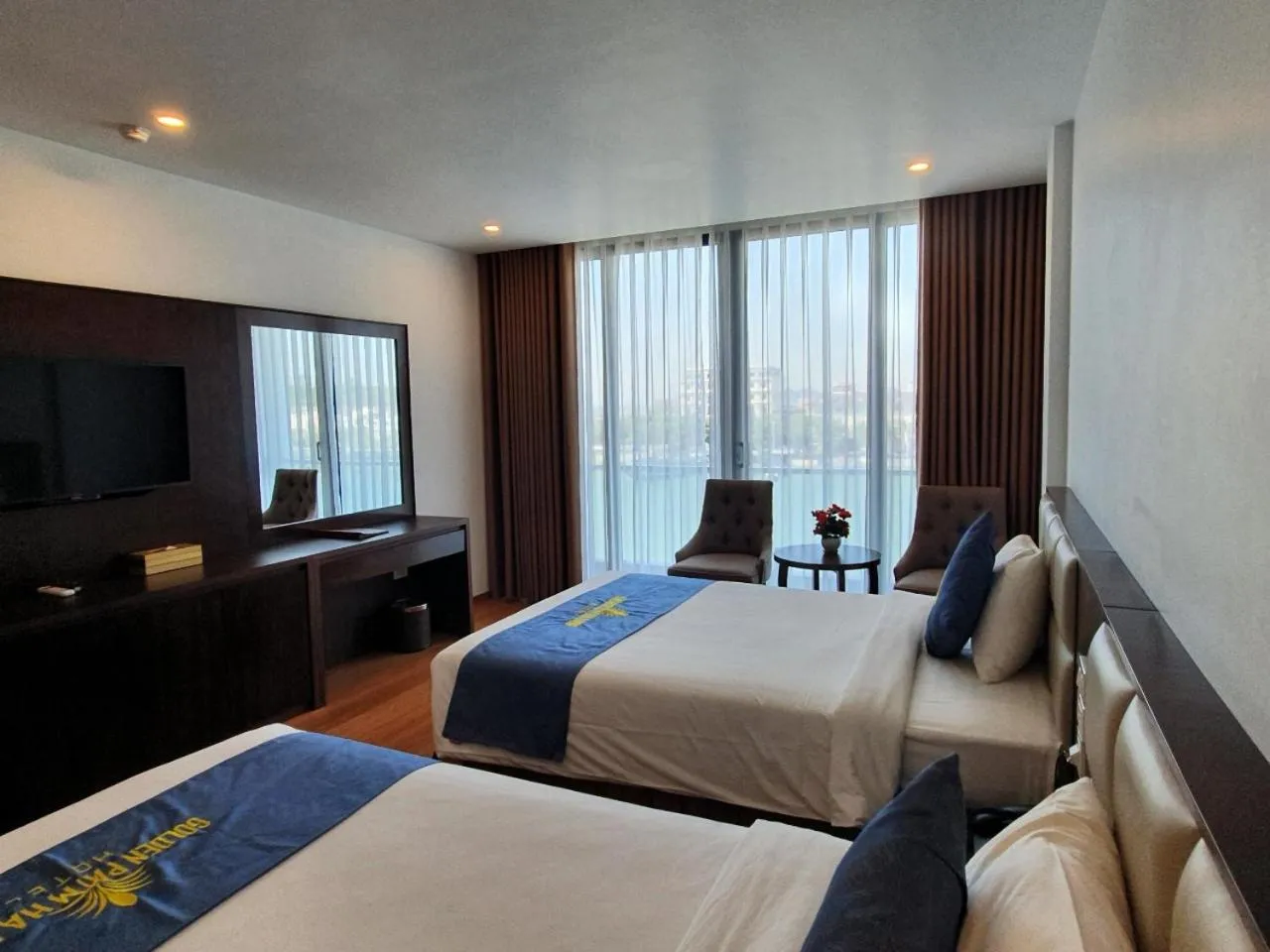 Bed in Golden Palm HaLong Hotel