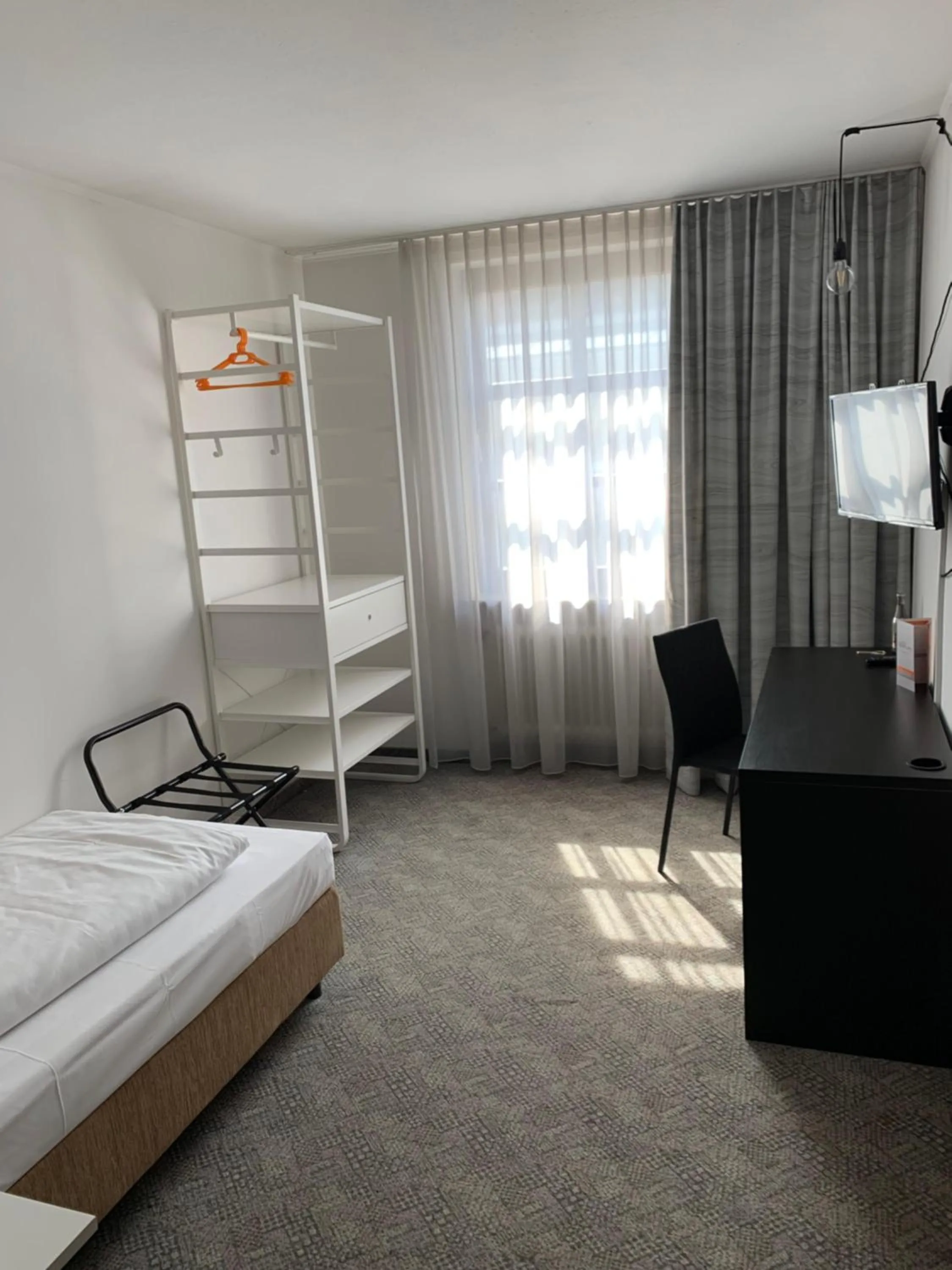 Photo of the whole room, Bed in Hotel Maxplatz