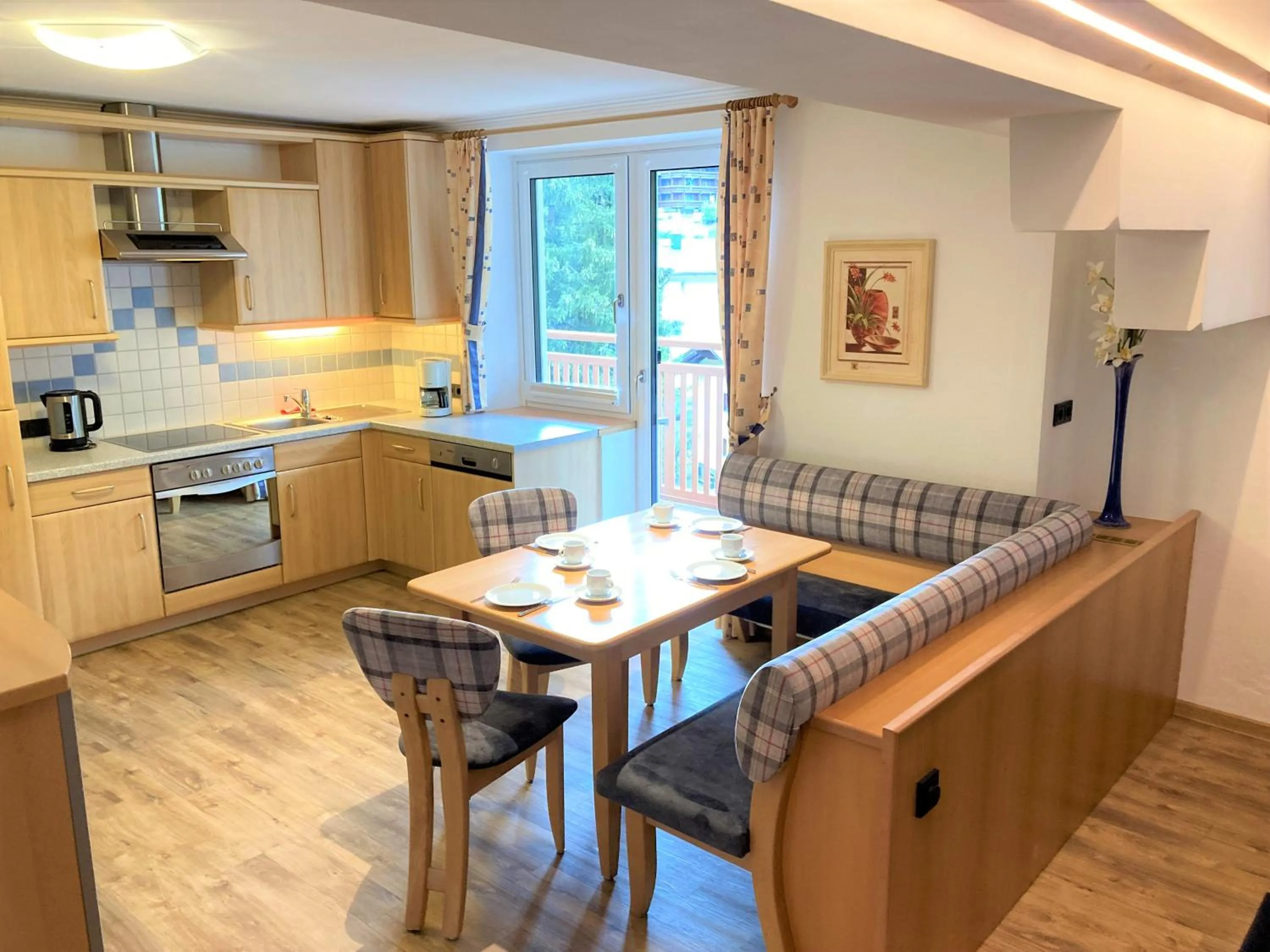 kitchen in Hotel Garni Siegmundshof - inclusive Joker Card im Sommer