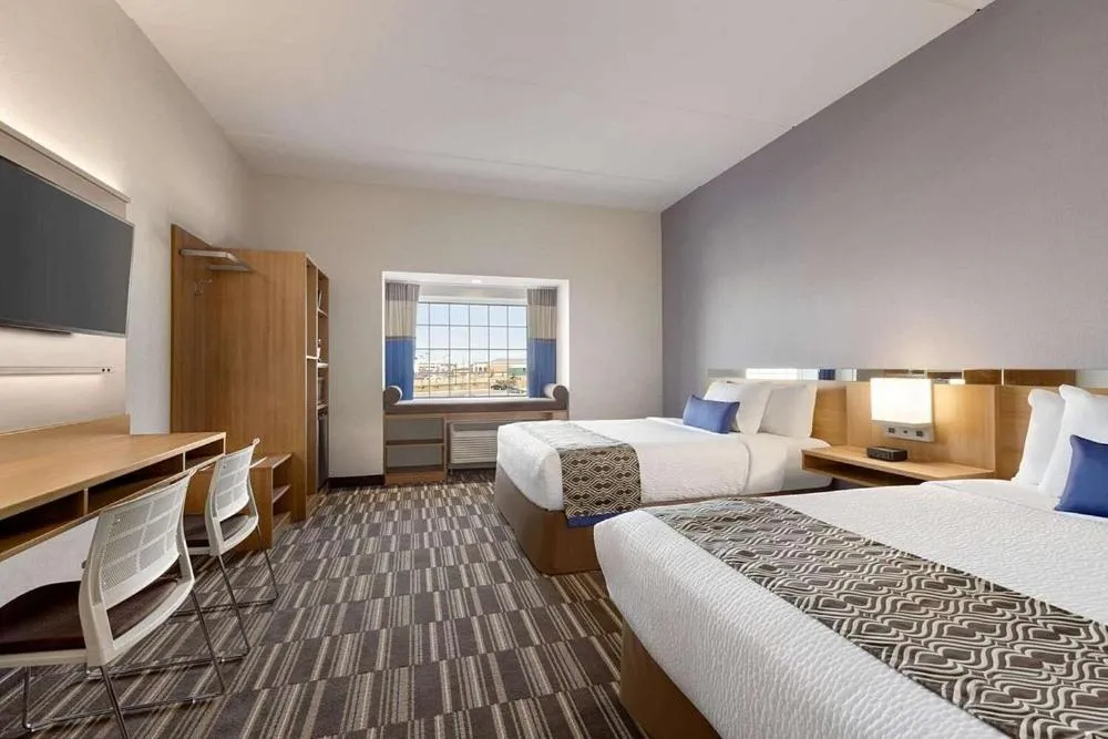 Bed in Microtel Inn & Suites by Wyndham Gambrills