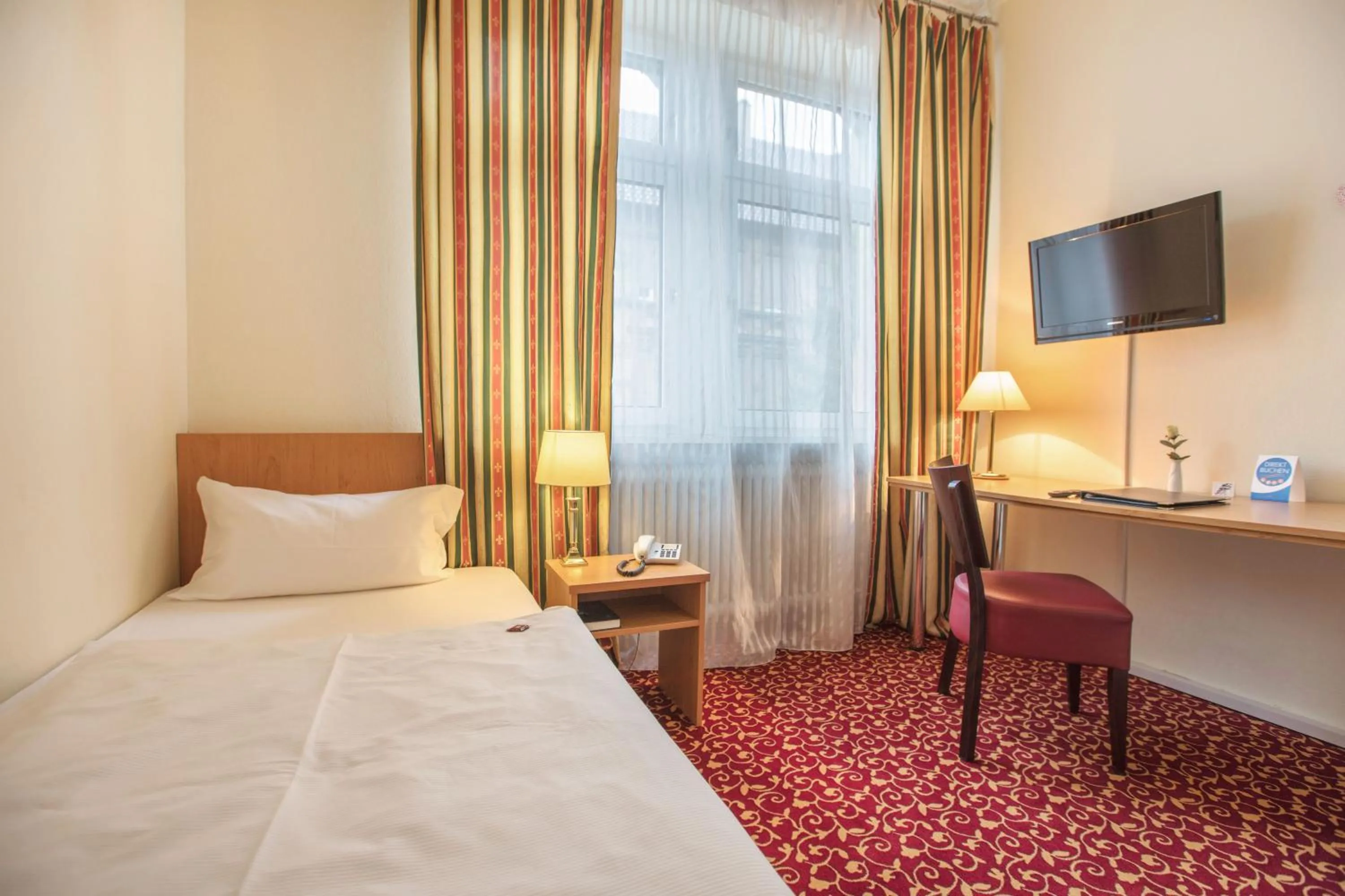 Photo of the whole room, Bed in Hotel Markgräfler Hof