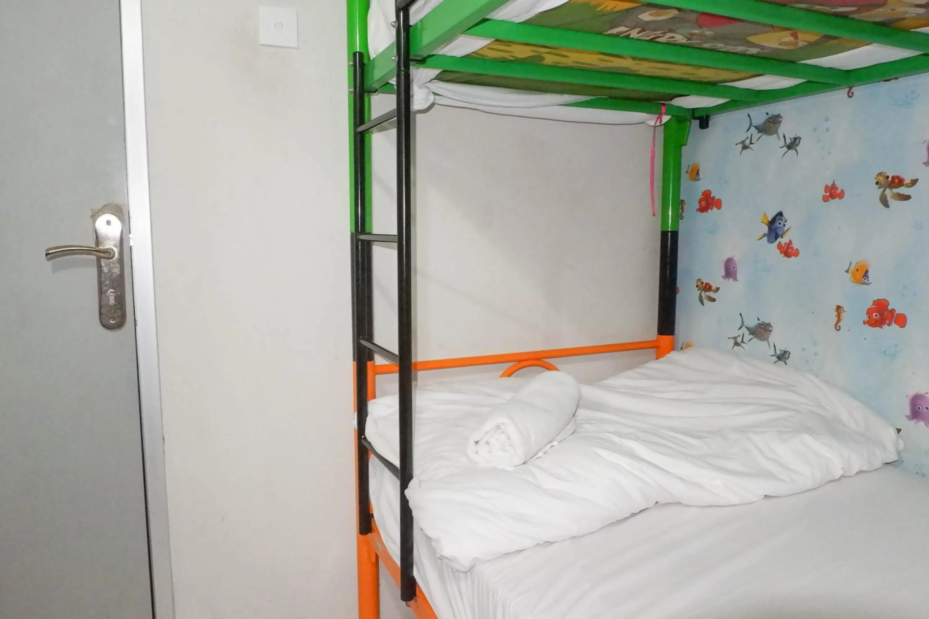 Bed in Minimalist 2BR Apartment at Dian Regency By Travelio