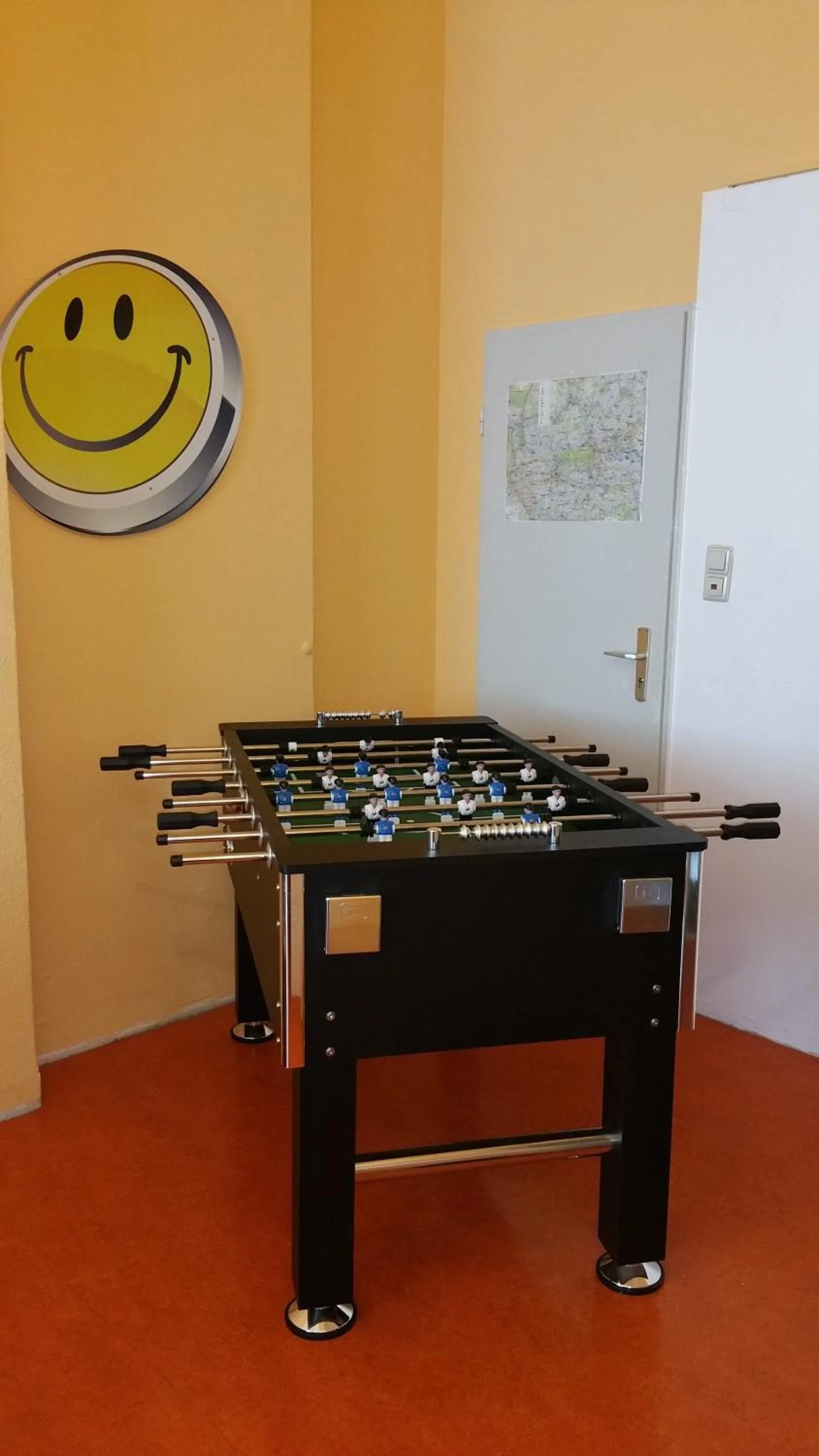 Game Room in Happy Go Lucky Hotel + Hostel