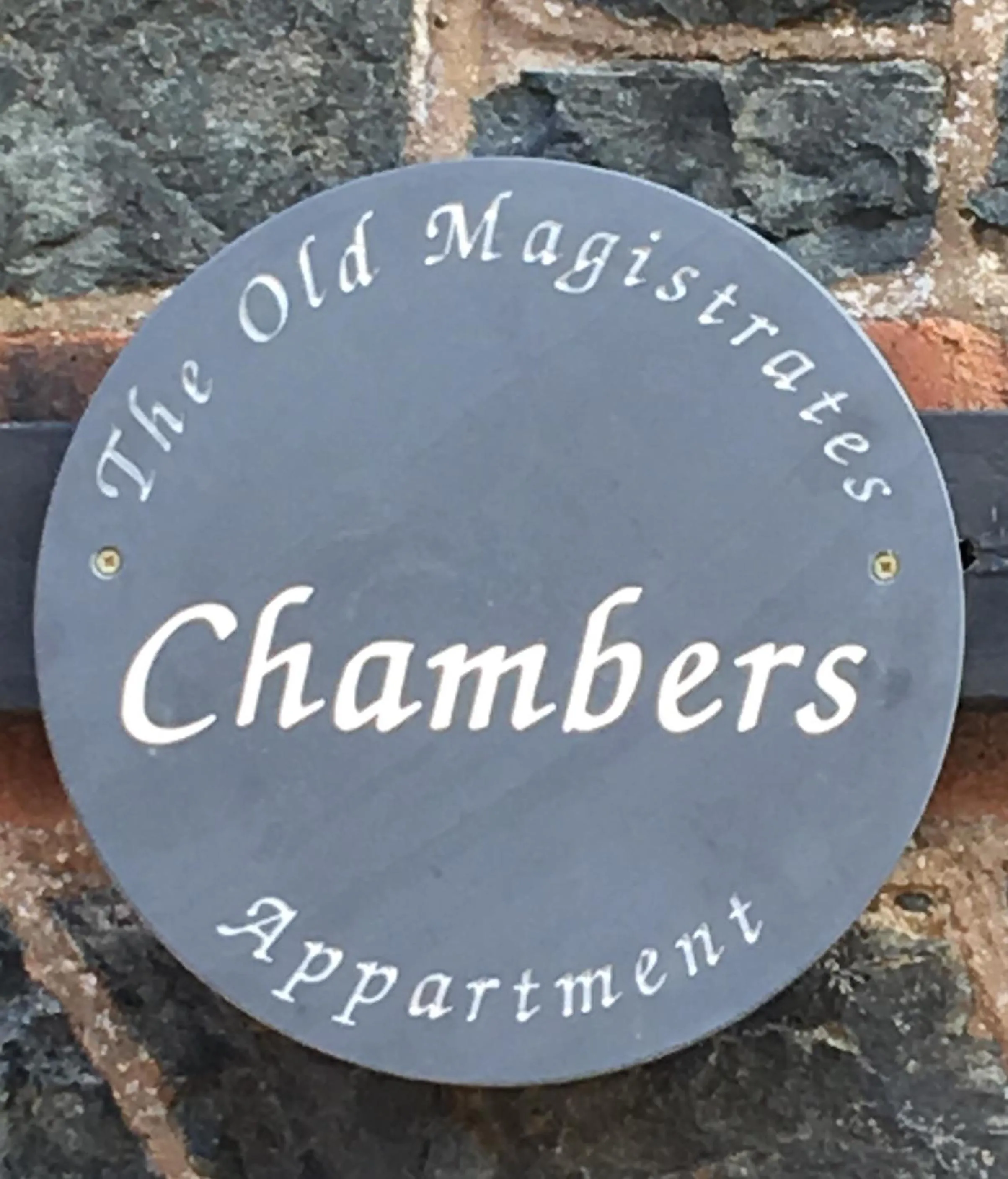 Property logo or sign in Chambers Apartment @ The Old Magistrates