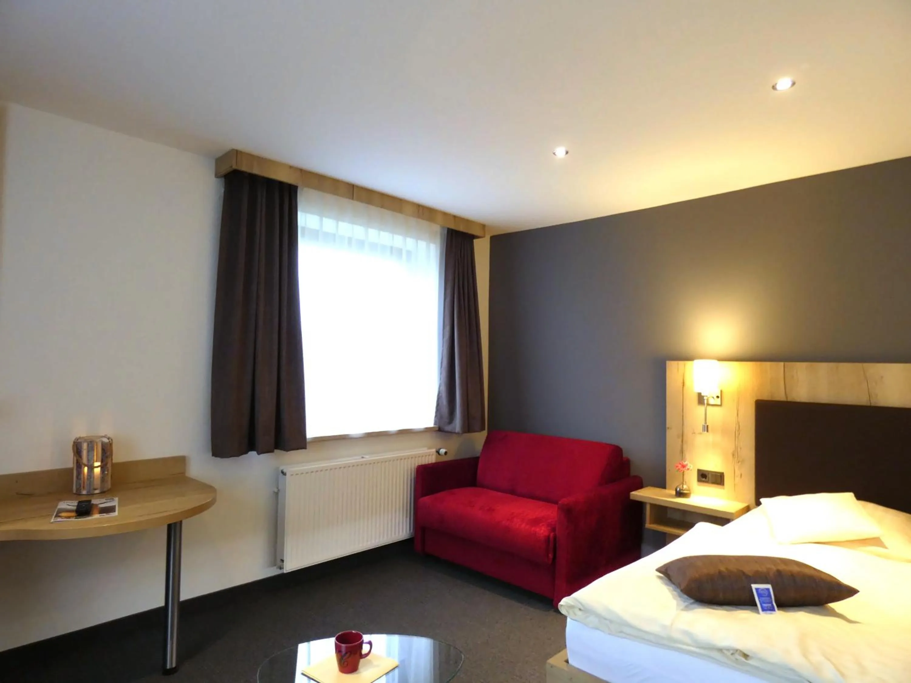 Photo of the whole room, Bed in Akzent Hotel Cordes & Restaurant am Rosengarten