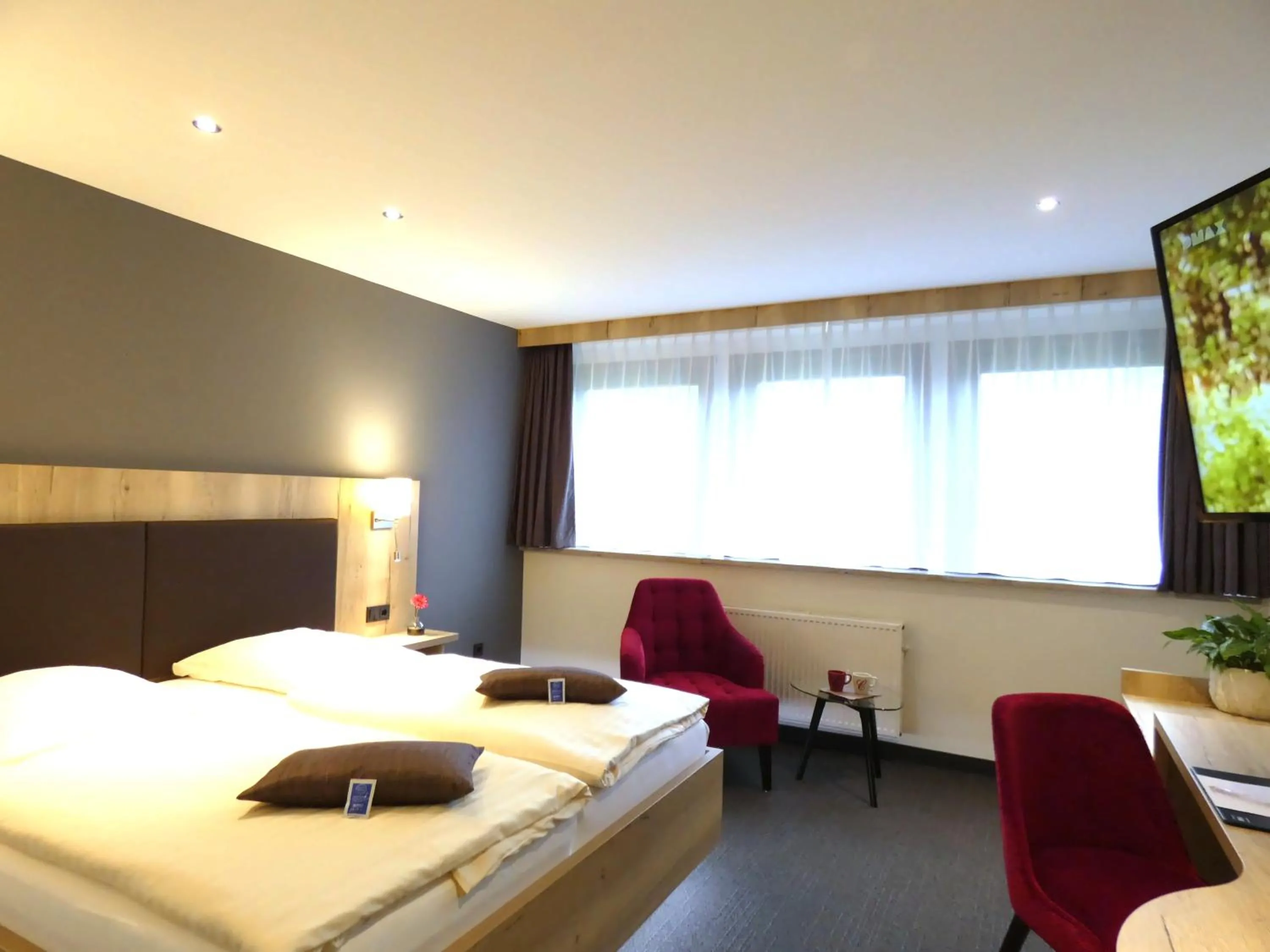 Photo of the whole room, Bed in Akzent Hotel Cordes & Restaurant am Rosengarten