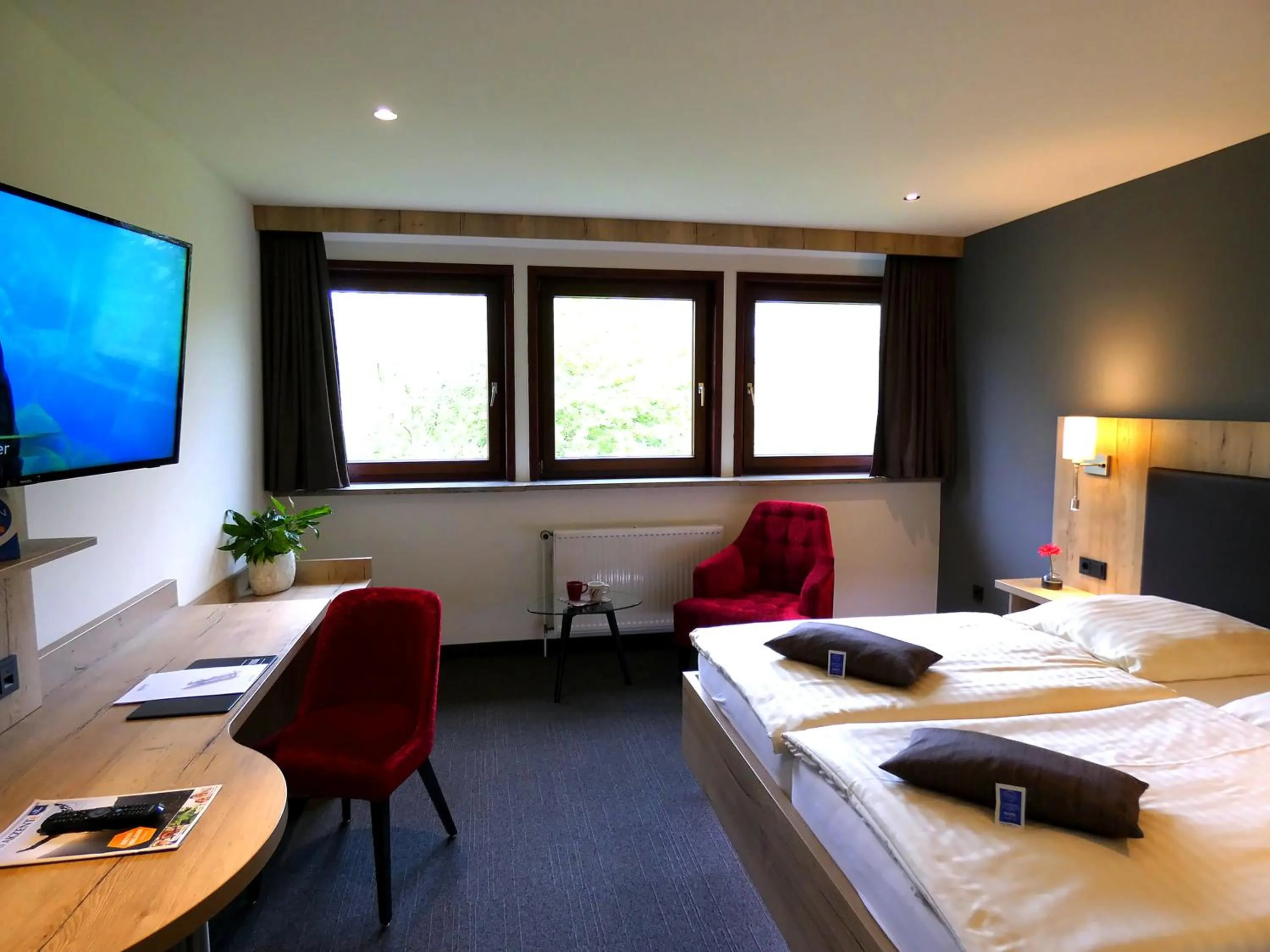 Photo of the whole room, Bed in Akzent Hotel Cordes & Restaurant am Rosengarten