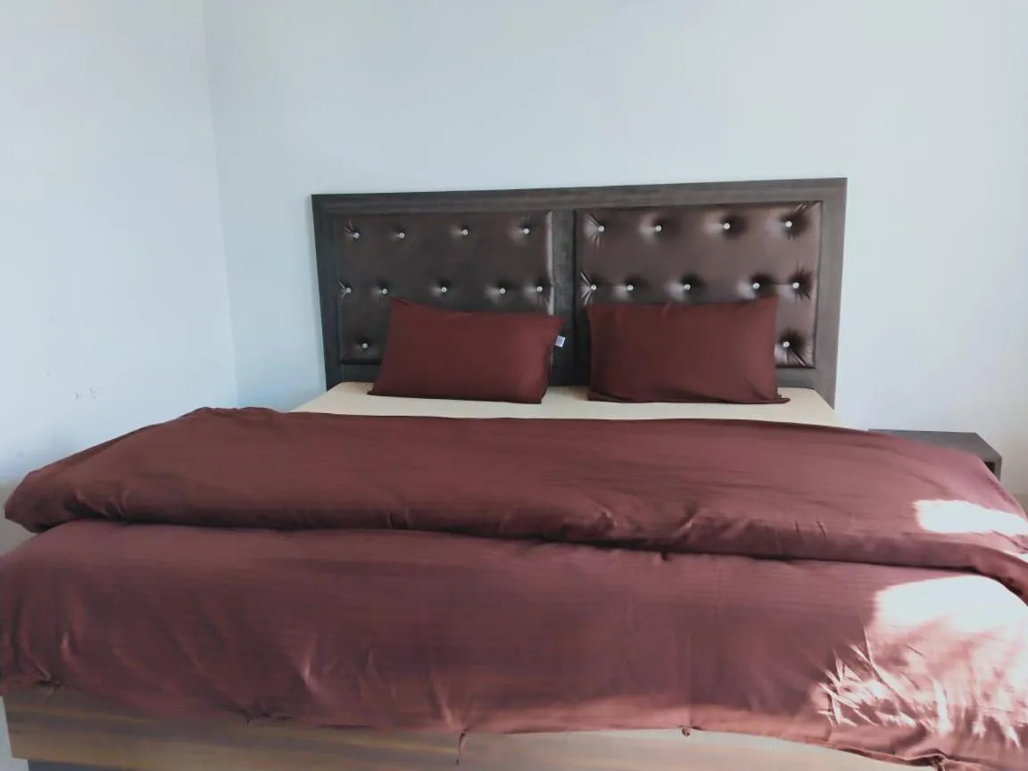 Bed in Pahadi Ghar Homestay