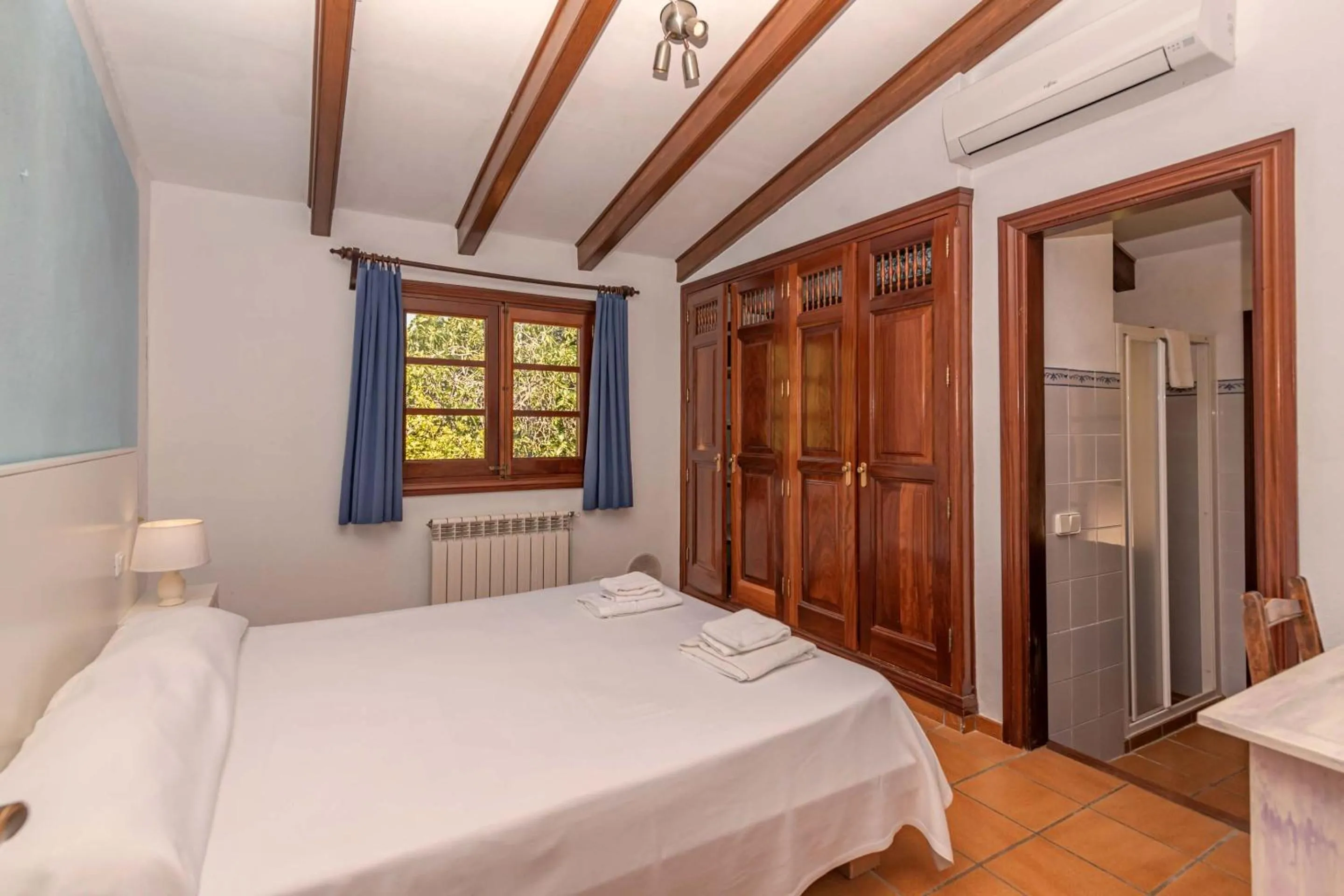 Bed in Villa Colonya by Sealand Villas