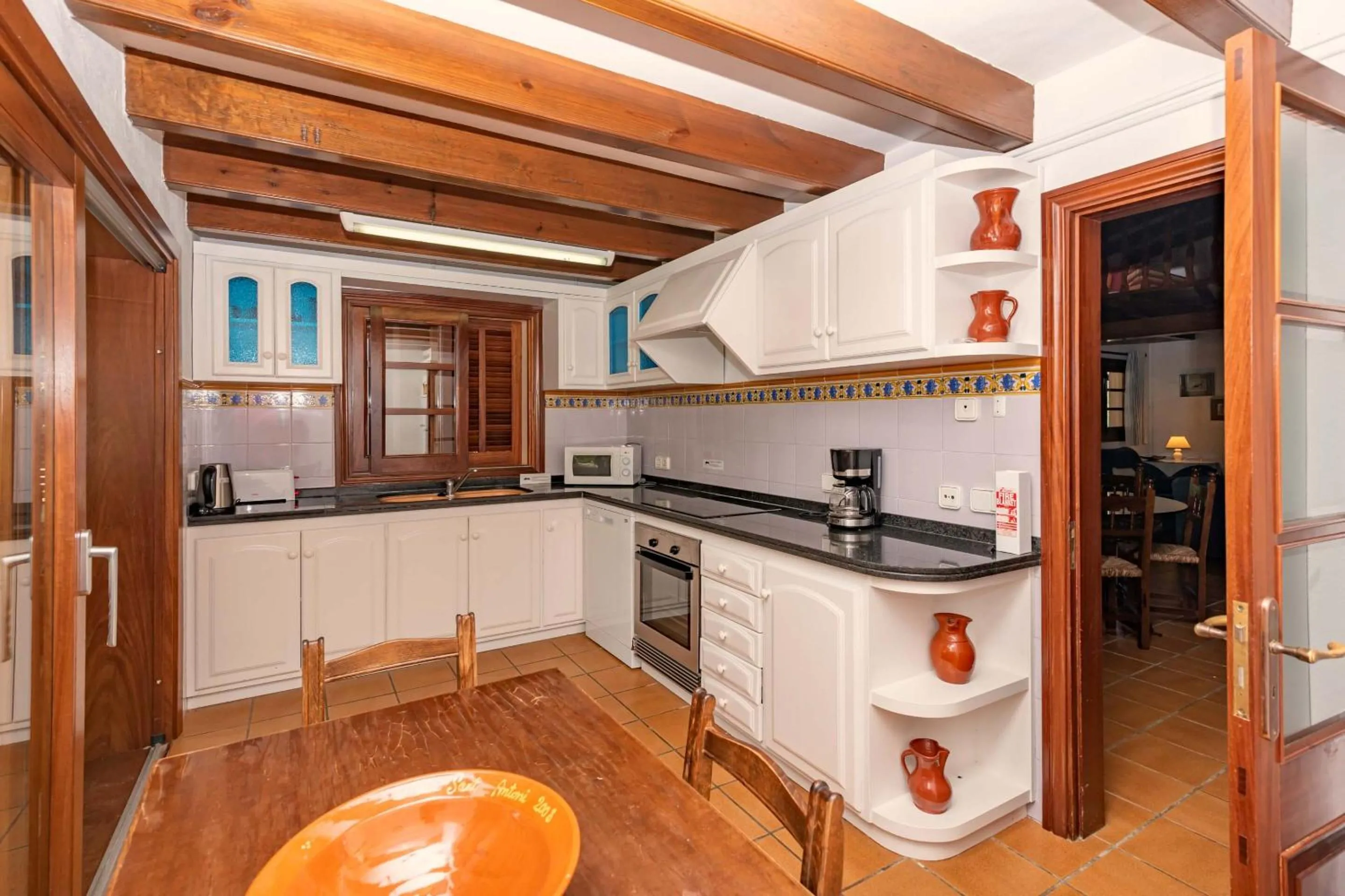 Kitchen or kitchenette in Villa Colonya by Sealand Villas