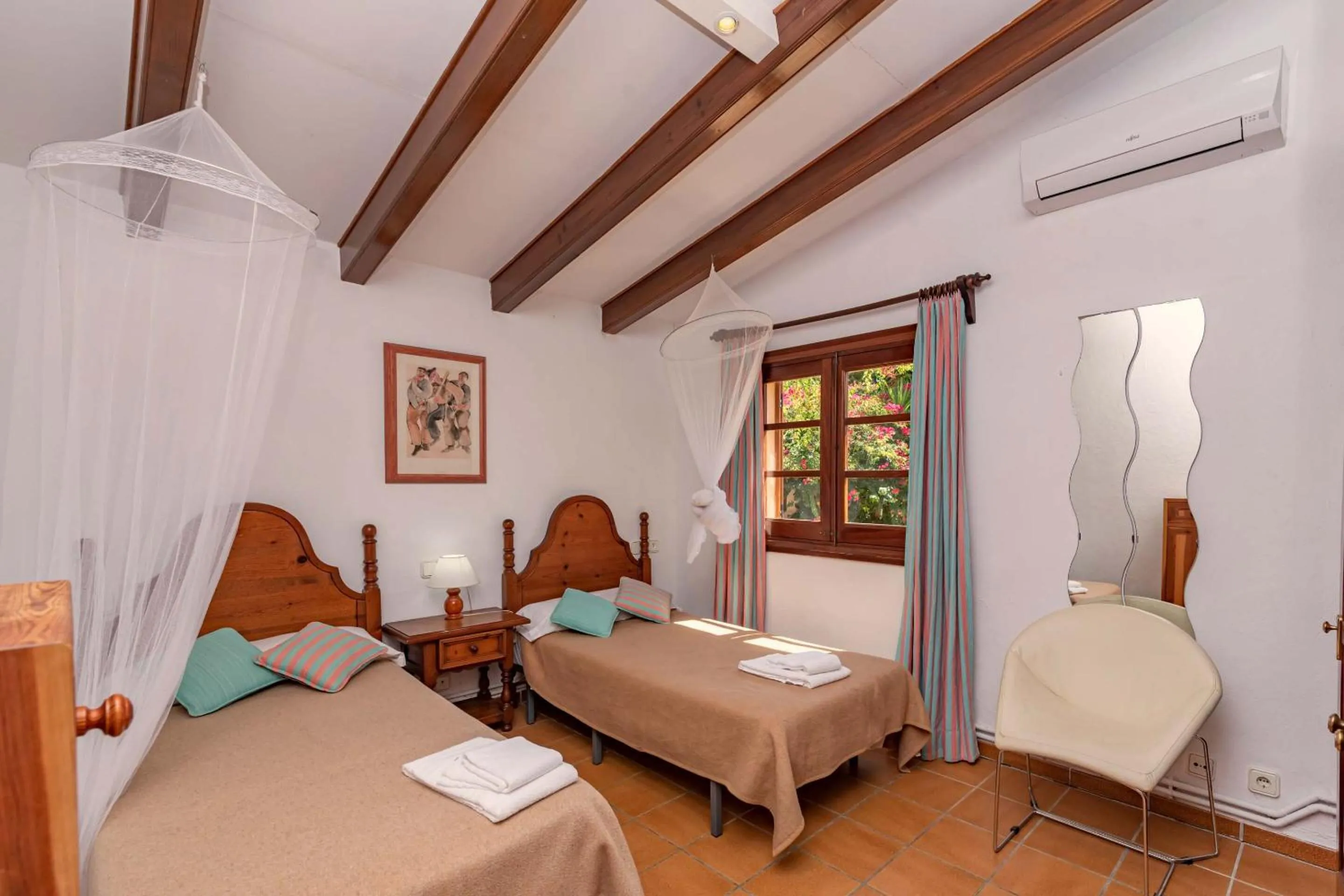 Bed in Villa Colonya by Sealand Villas