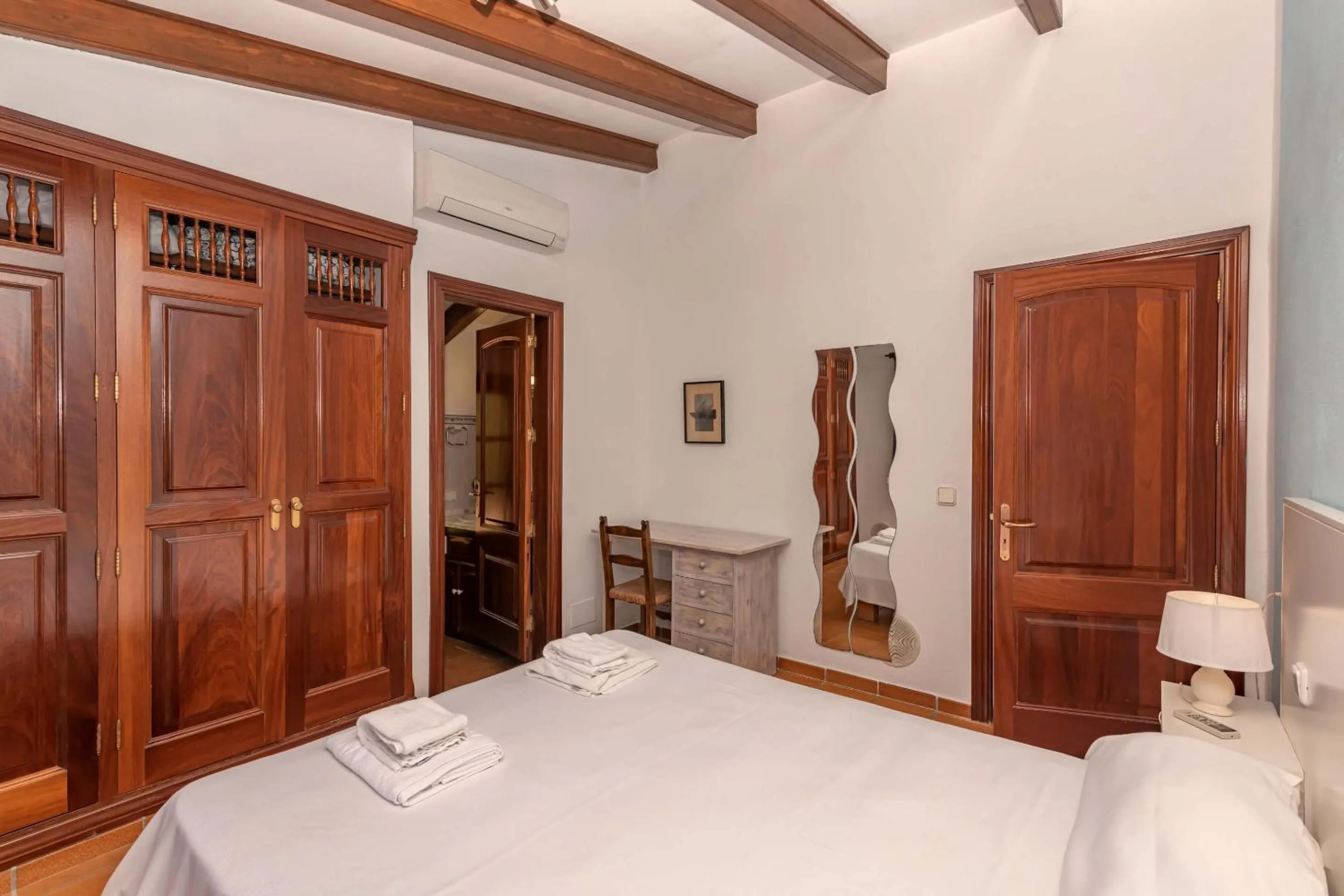 Bed in Villa Colonya by Sealand Villas