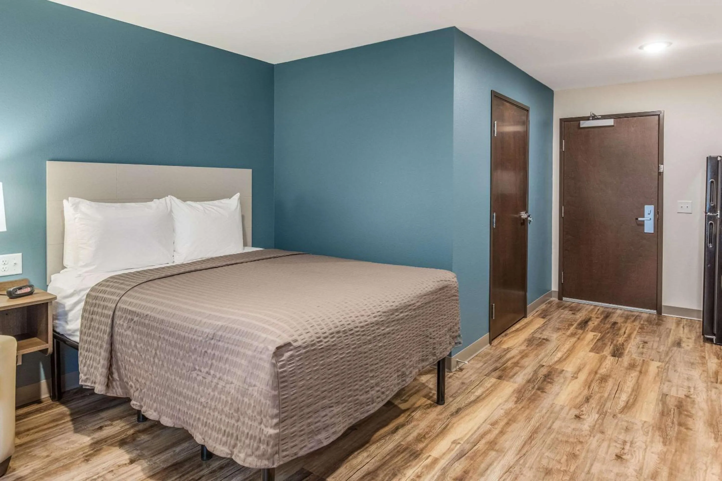 Photo of the whole room, Bed in WoodSpring Suites Greenville Haywood Mall