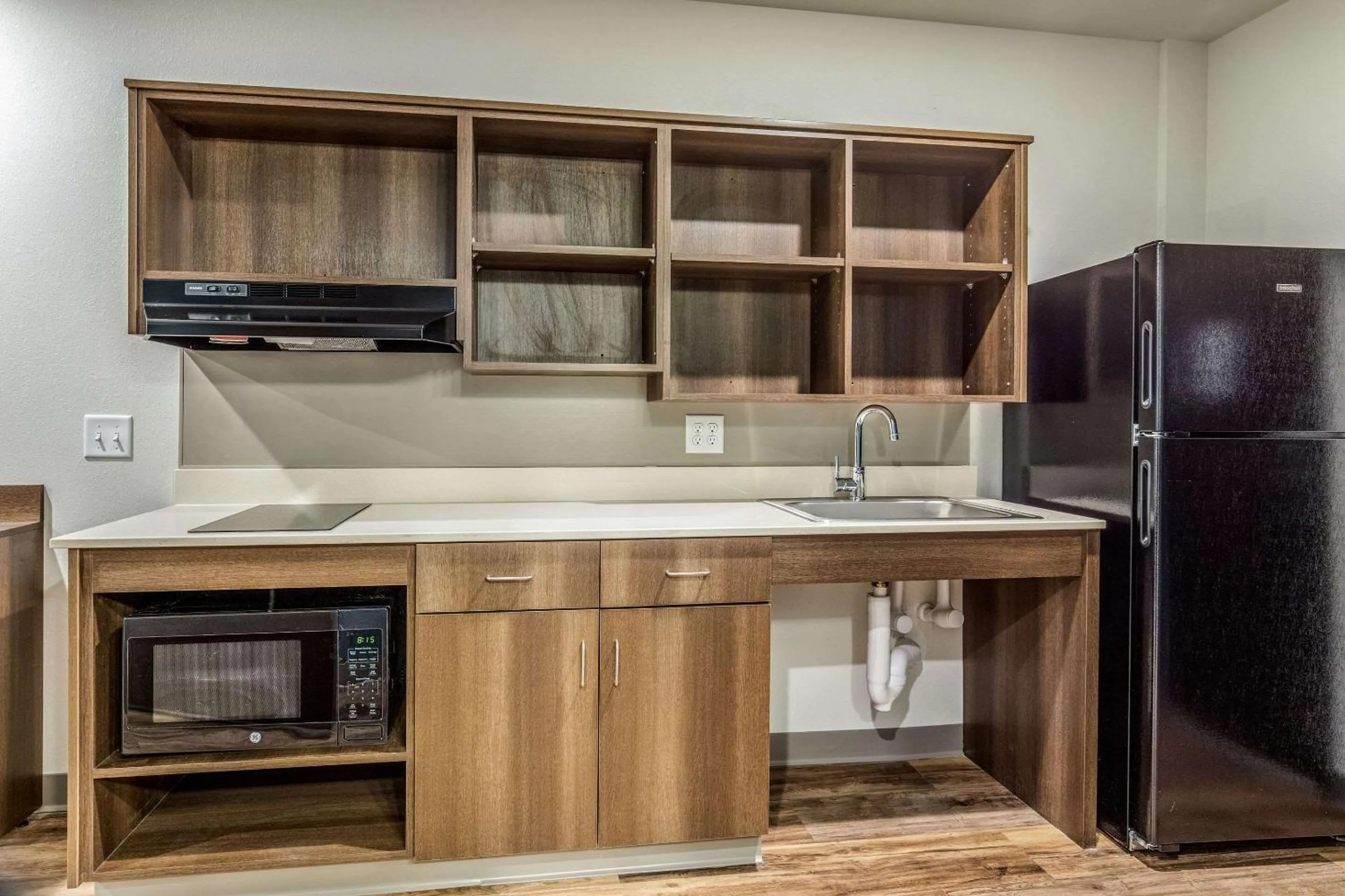 Photo of the whole room in WoodSpring Suites Greenville Haywood Mall