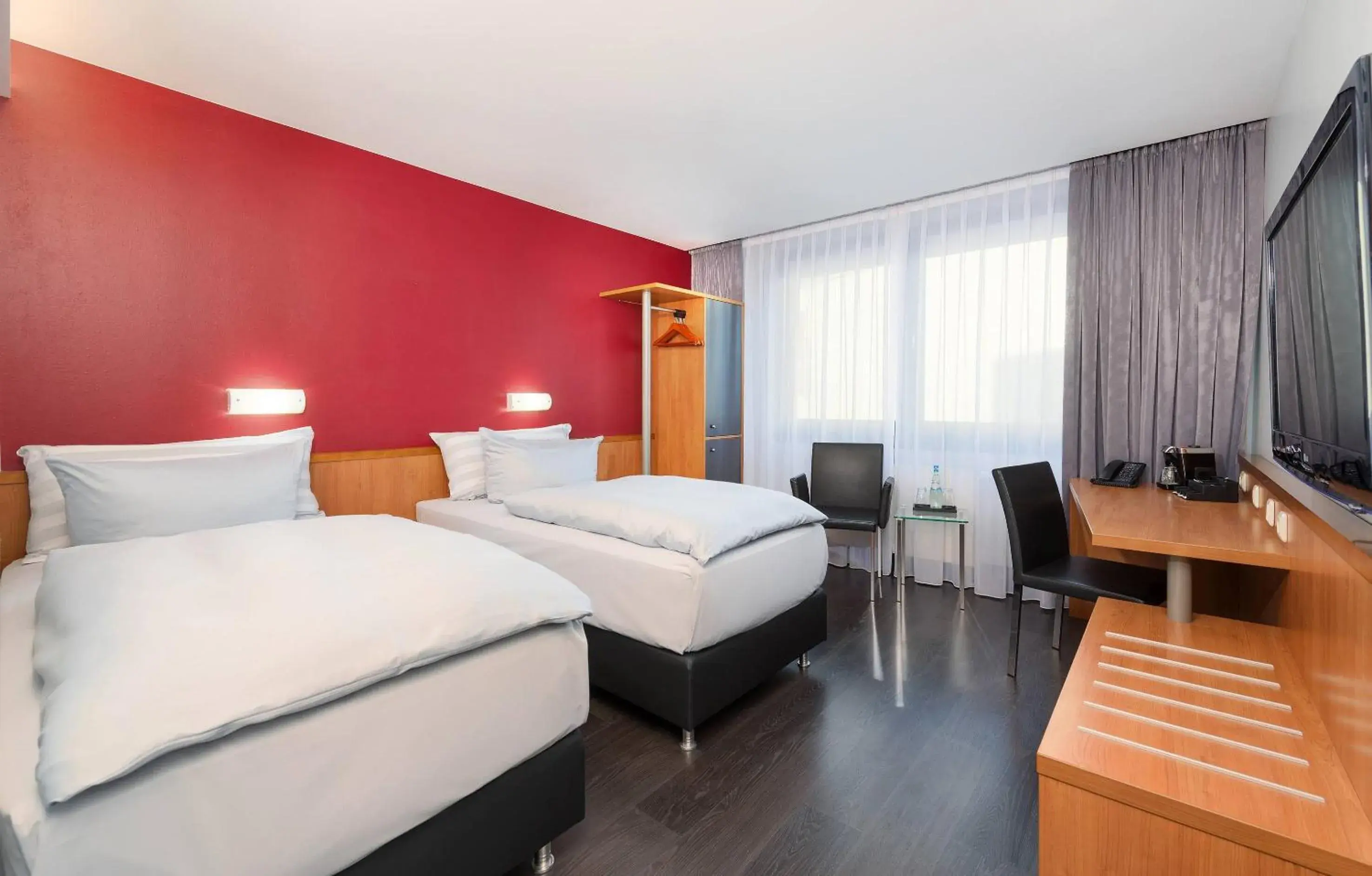 Bed in Hotel Wolfsburg Centrum Affiliated by Meliá Bed in Hotel Wolfsburg Centrum Affiliated by Meliá