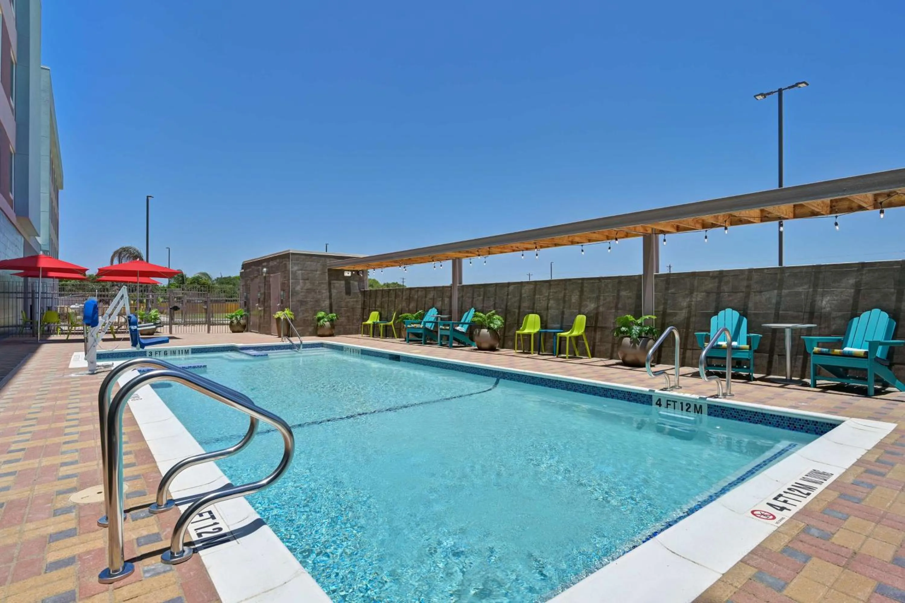 Pool view in Home2 Suites Corpus Christi Southeast, Tx