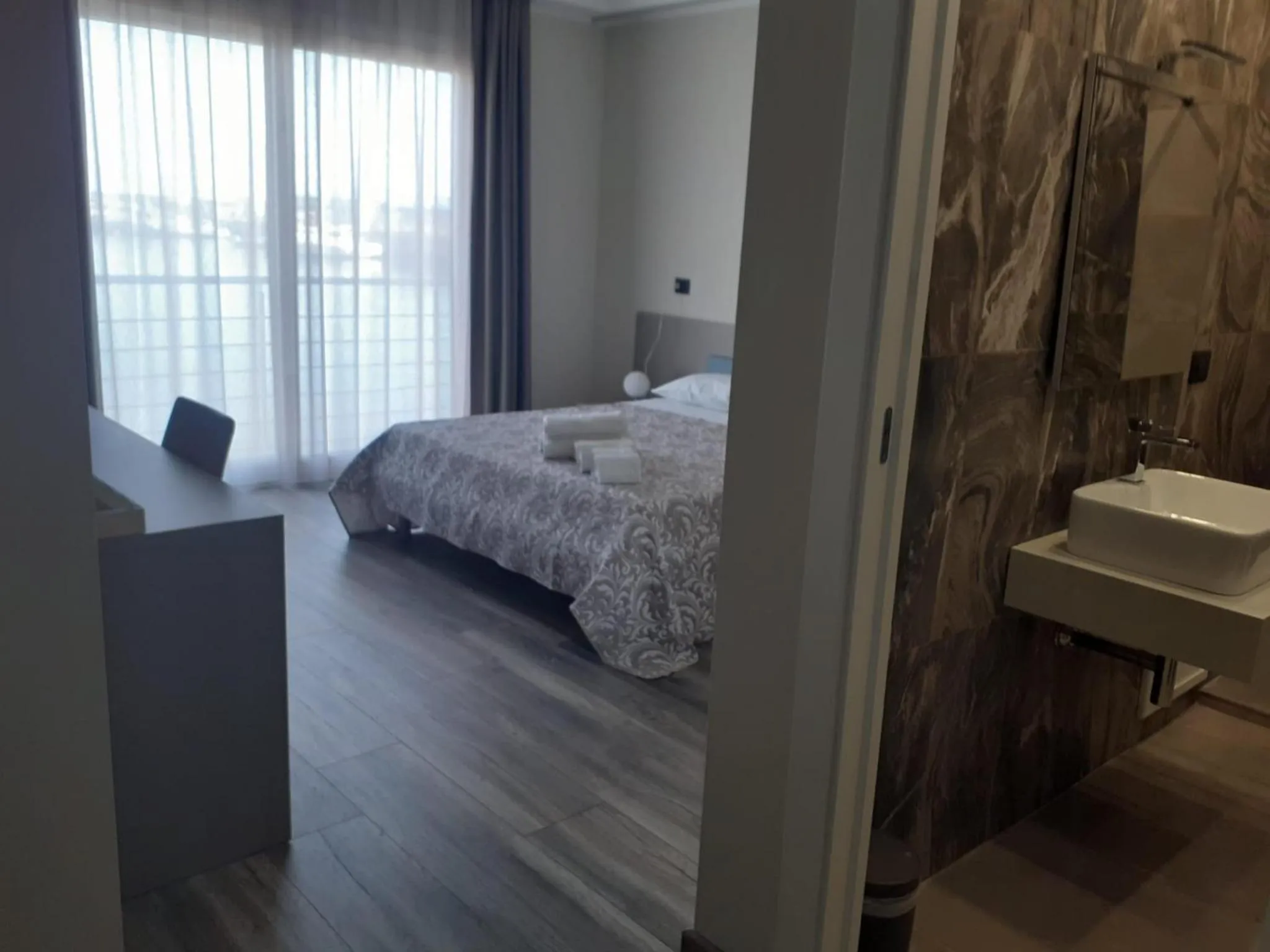 Bed in SARACENO HOTEL