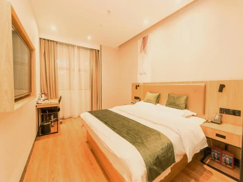 Bed in GreenTree Inn Nanjing Lukou Airport