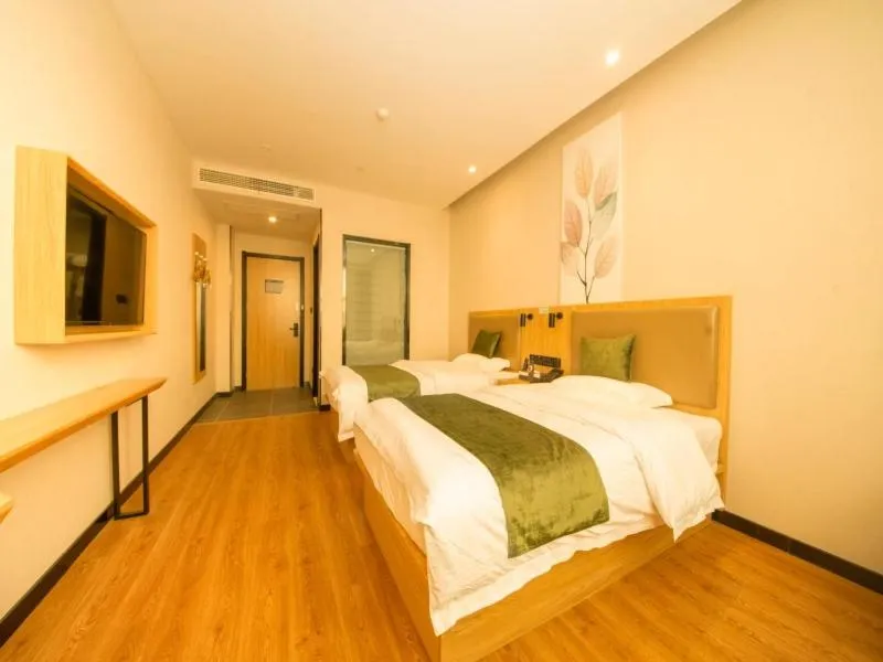 Bed in GreenTree Inn Nanjing Lukou Airport