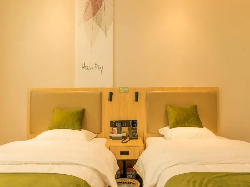 Bed in GreenTree Inn Nanjing Lukou Airport