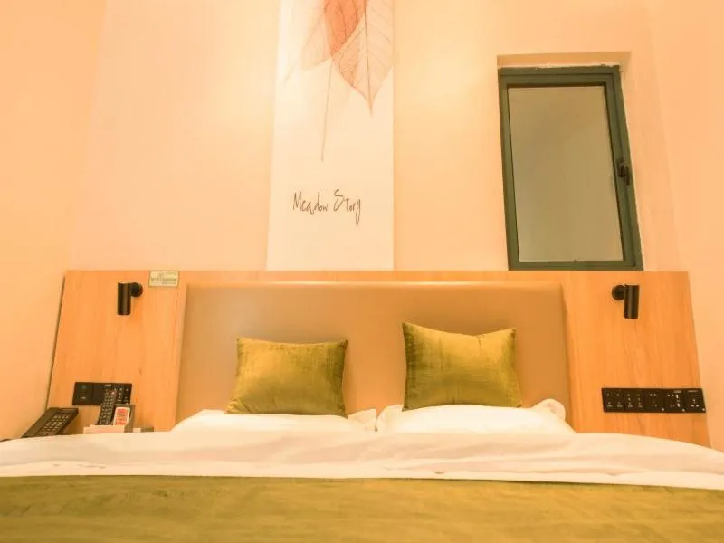 Bed in GreenTree Inn Nanjing Lukou Airport