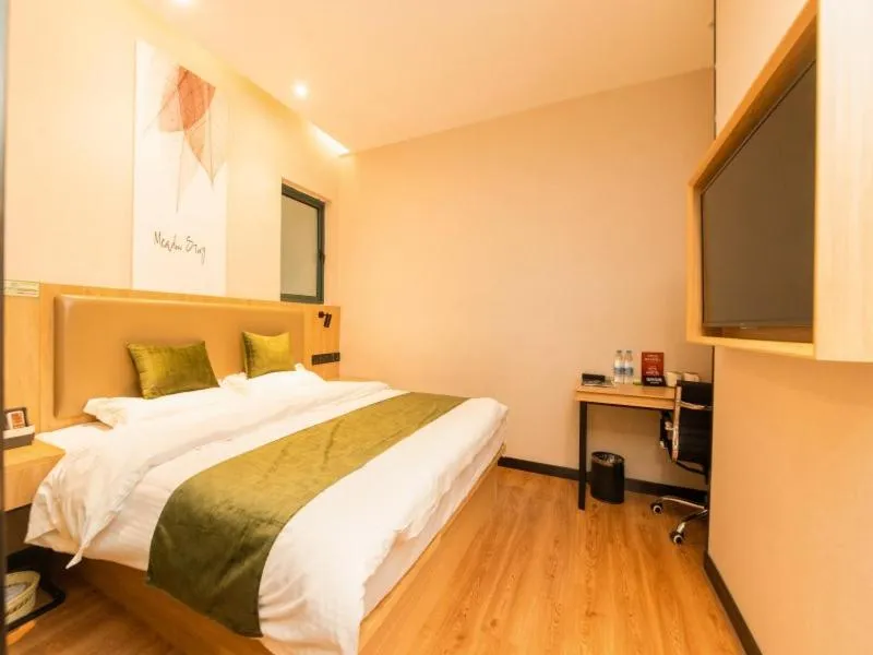 Bed in GreenTree Inn Nanjing Lukou Airport