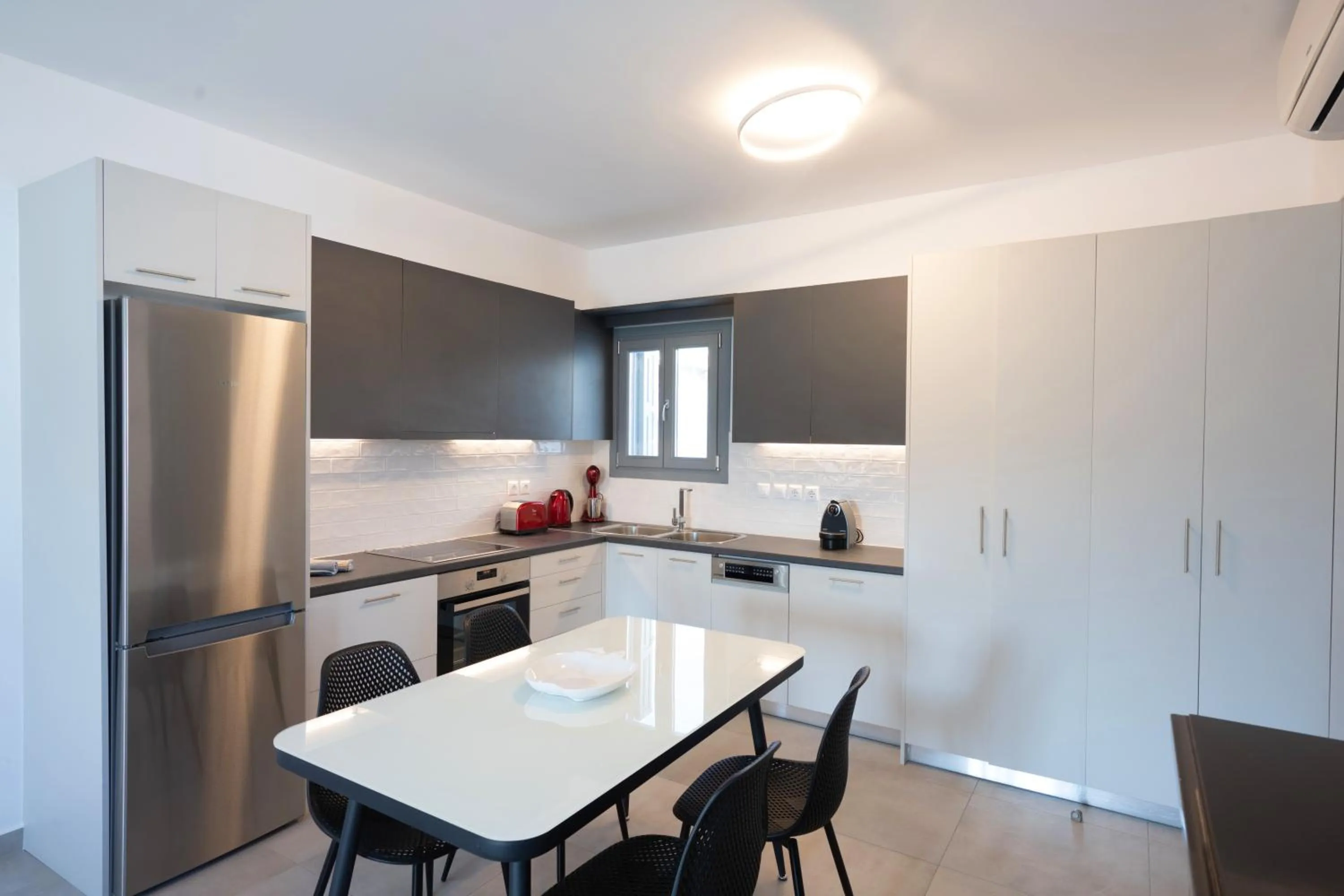 Kitchen or kitchenette in Mykonos Dot Apartments