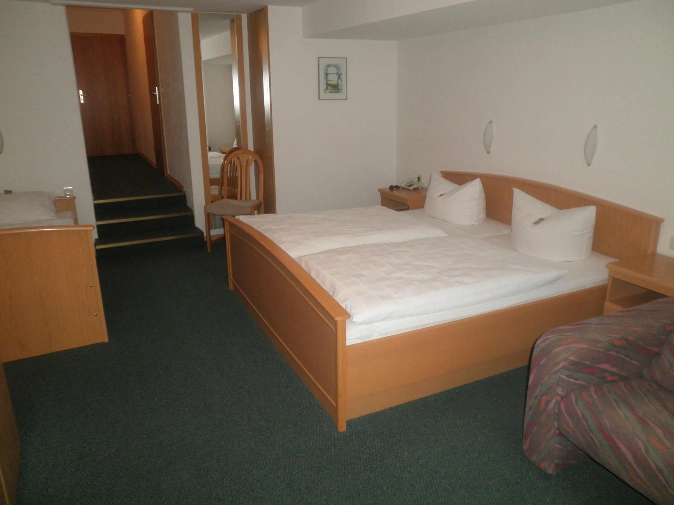 Photo of the whole room, Bed in Hotel Munzert