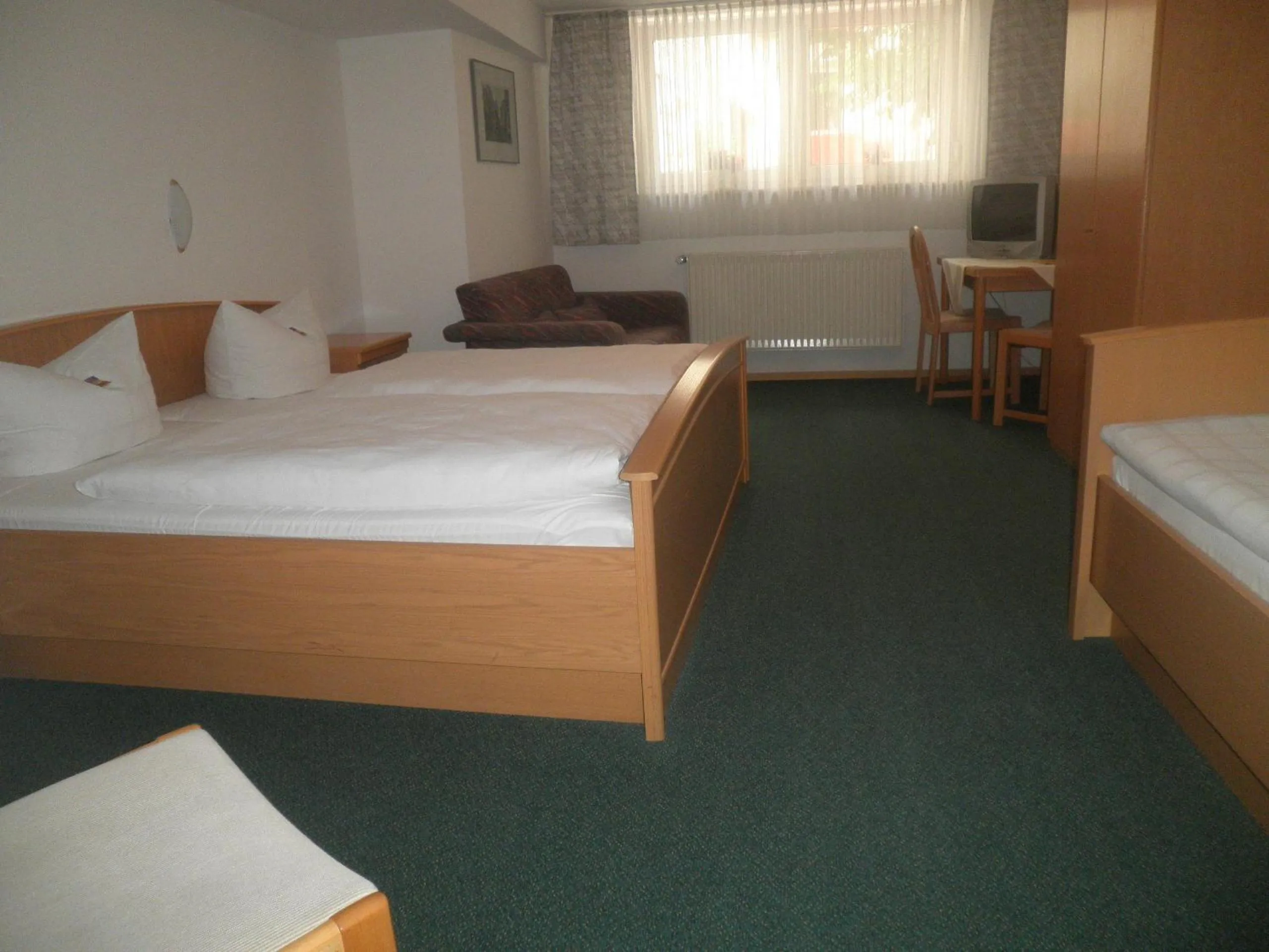 Photo of the whole room, Bed in Hotel Munzert