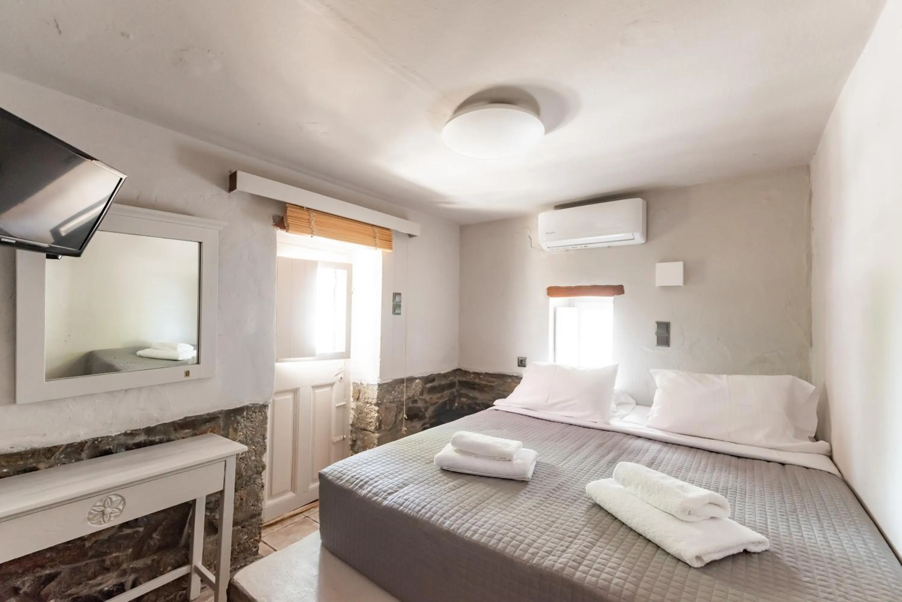 Bed in Rania Apartments Sea View