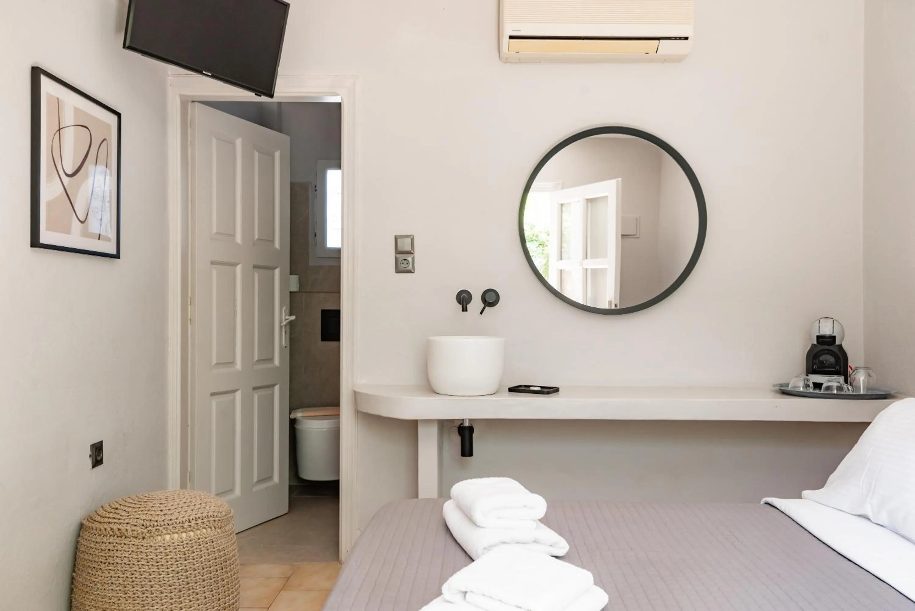 Bed in Rania Apartments Sea View