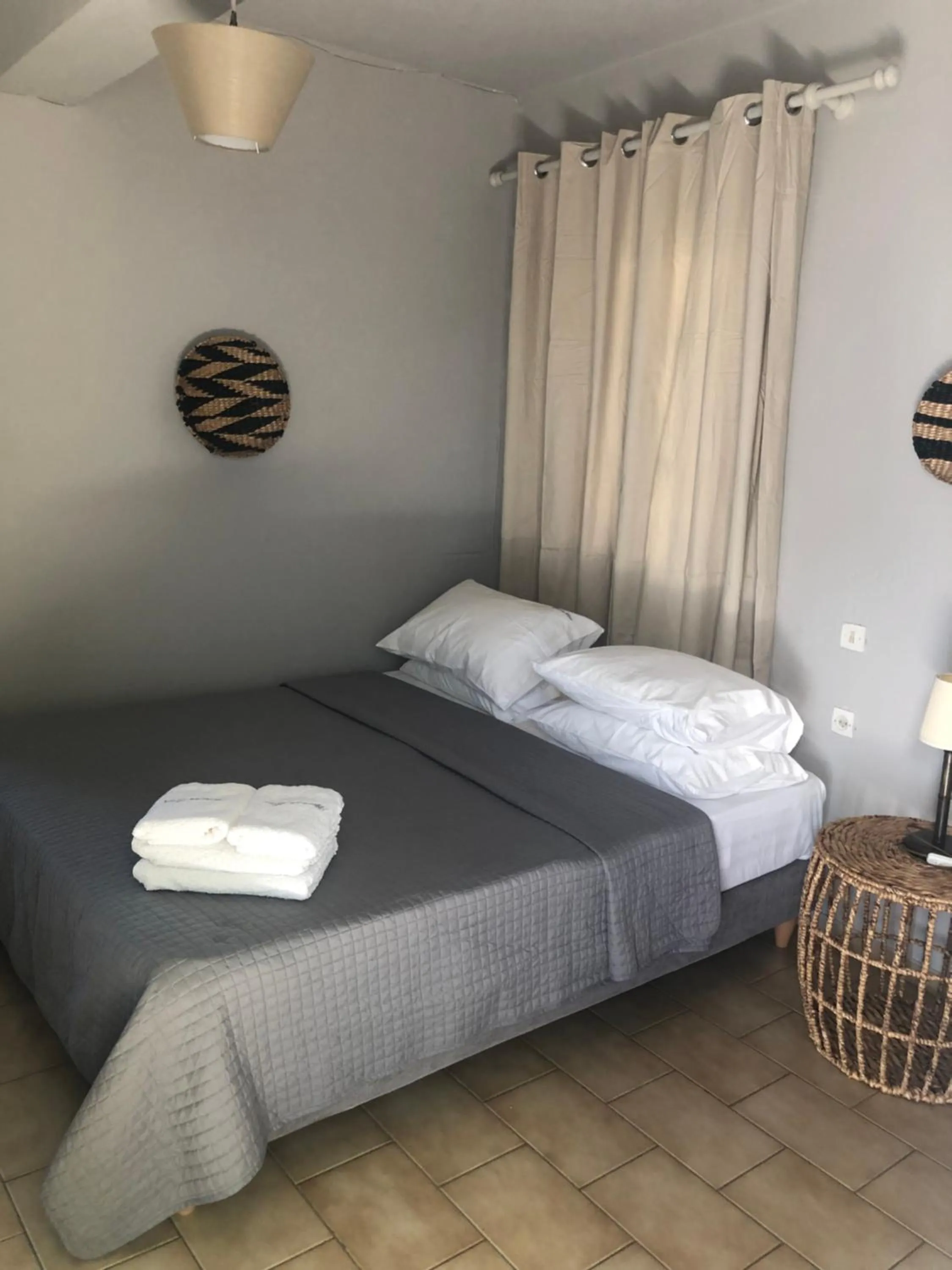 Bed in Rania Apartments Sea View