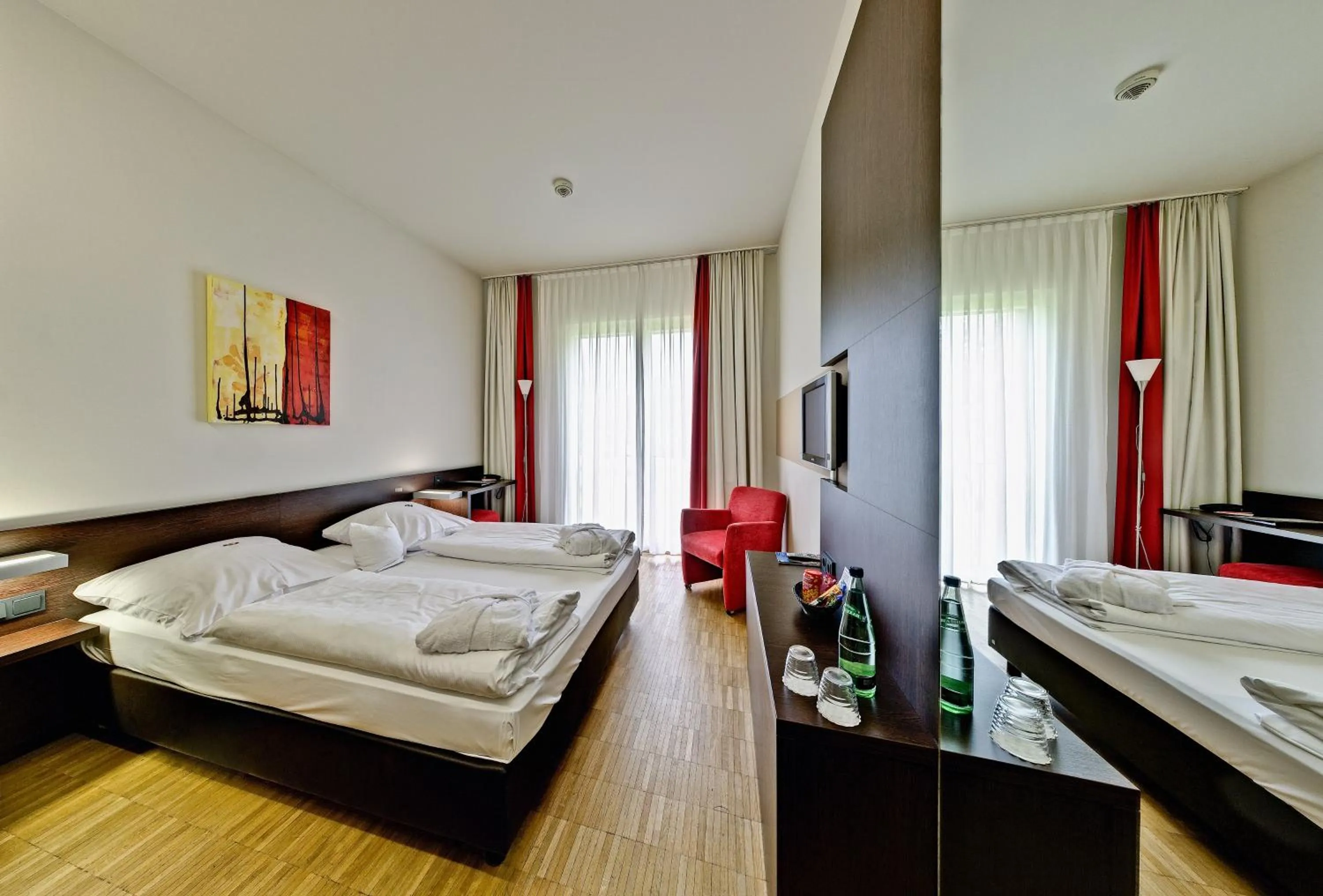 Living room, Bed in Santé Royale Hotel- & Gesundheitsresort Bad Brambach