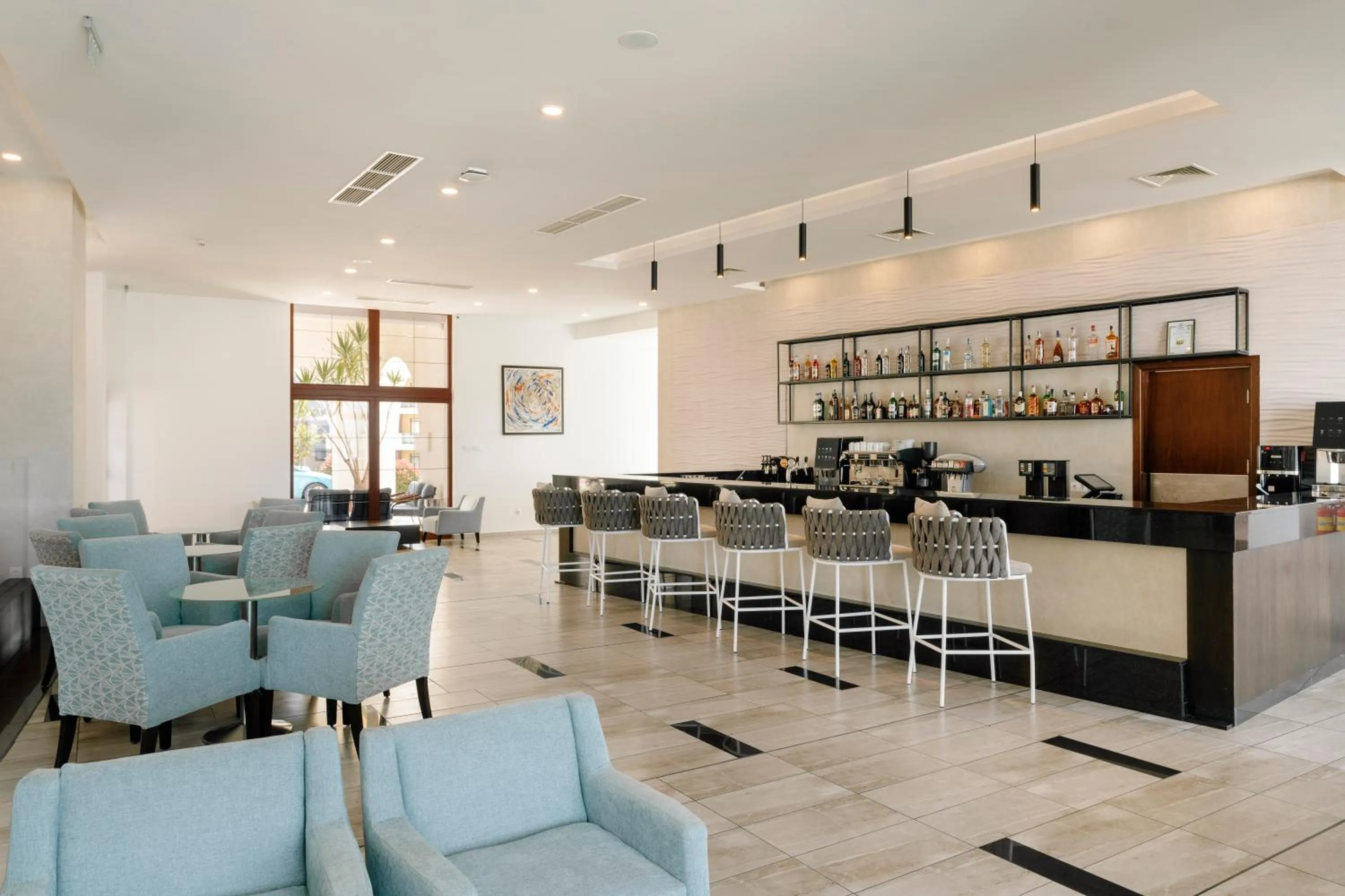 Lounge or bar in Alua Helios Bay - All Inclusive